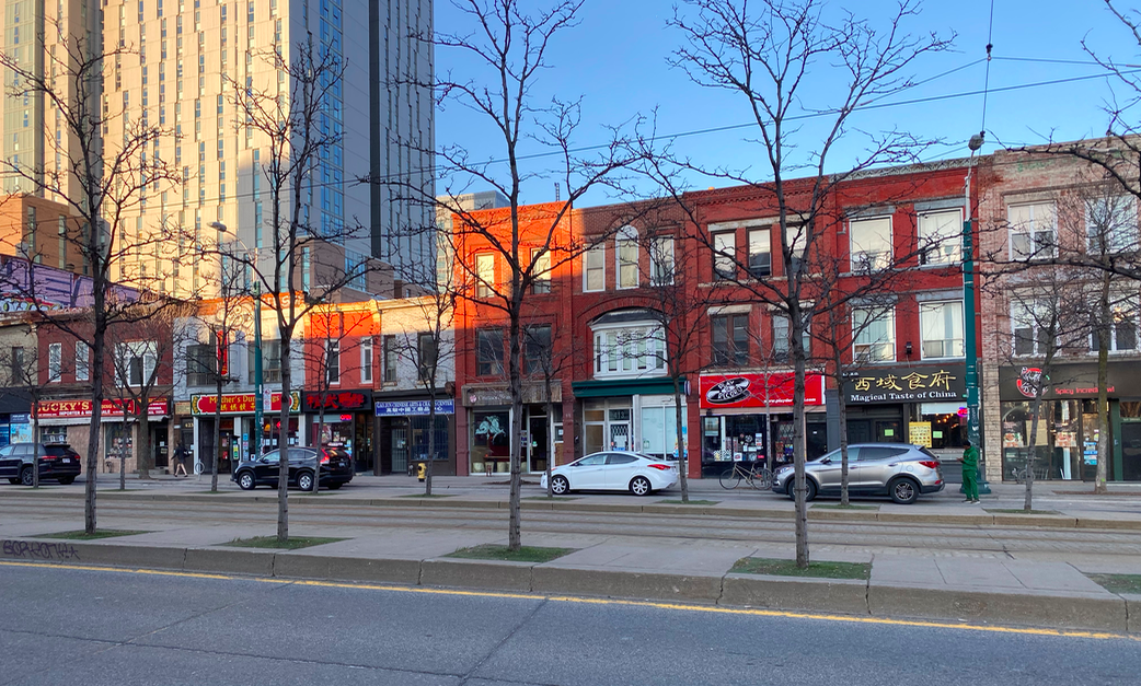 Spadina Avenue near College Street is home to numerous small businesses, including a notable music store. Photo: Craig Patterson