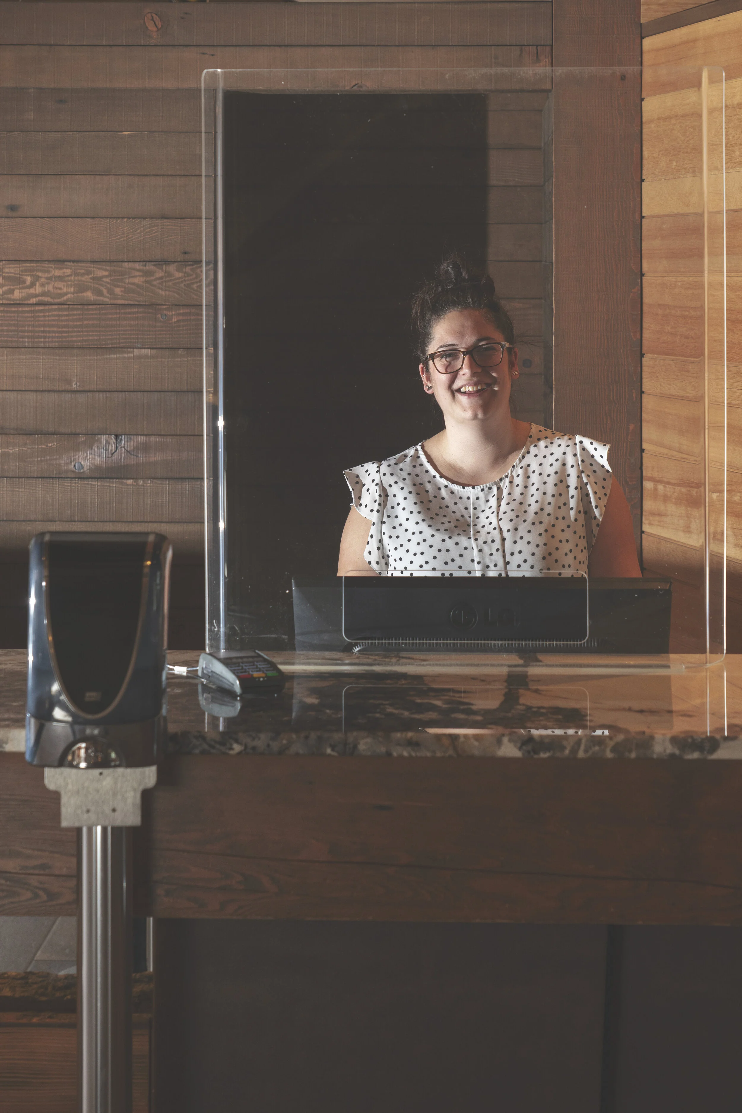 example of plexiglass shield at hotel desk. photo: peregrine