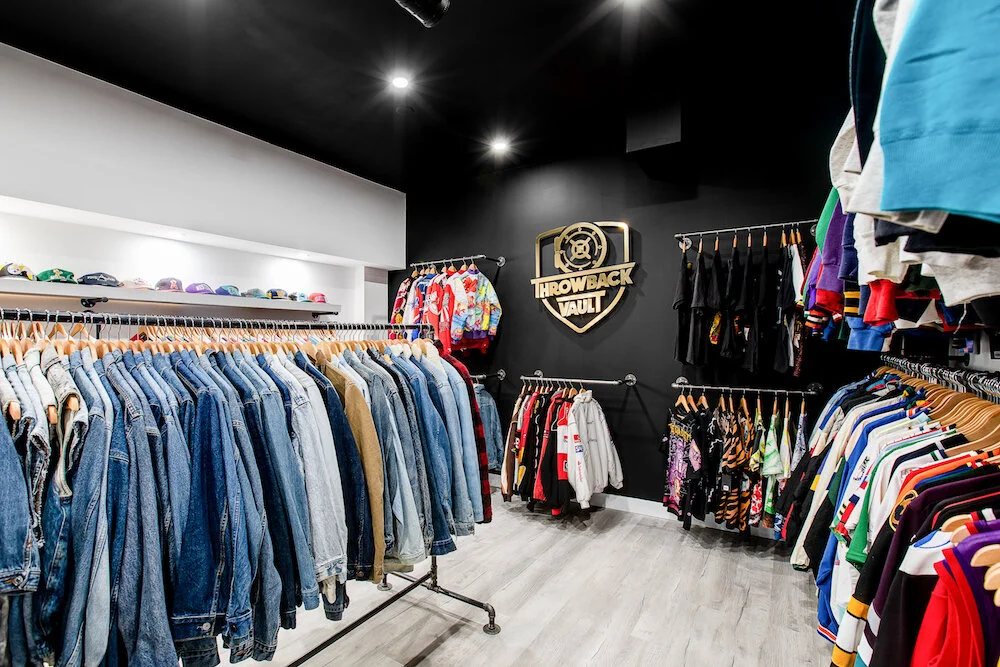 array of vintage denim and vintage sports jerseys available at throwback vault. photo: throwback vault