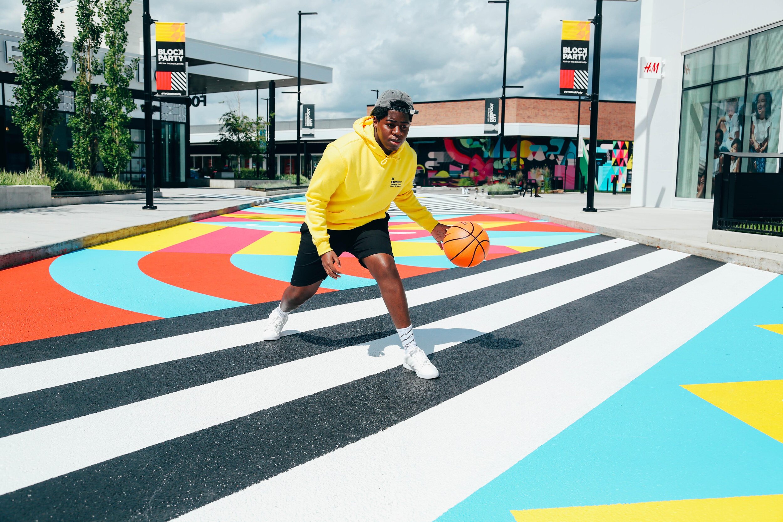 INTERACTIVE ART INSTALLATION AND ROAD MURAL. PHOTO: DEERFOOT CITY