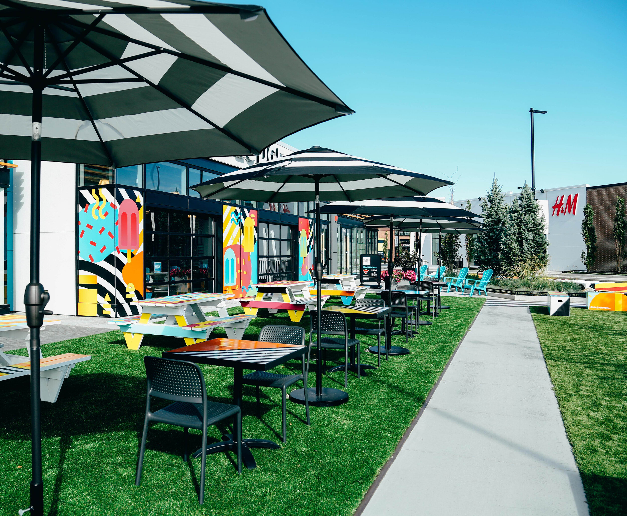 INTERACTIVE ART INSTALLATION AND PATIO SPACE OUTSIDE FOOD LODGE. PHOTO: DEERFOOT CITY