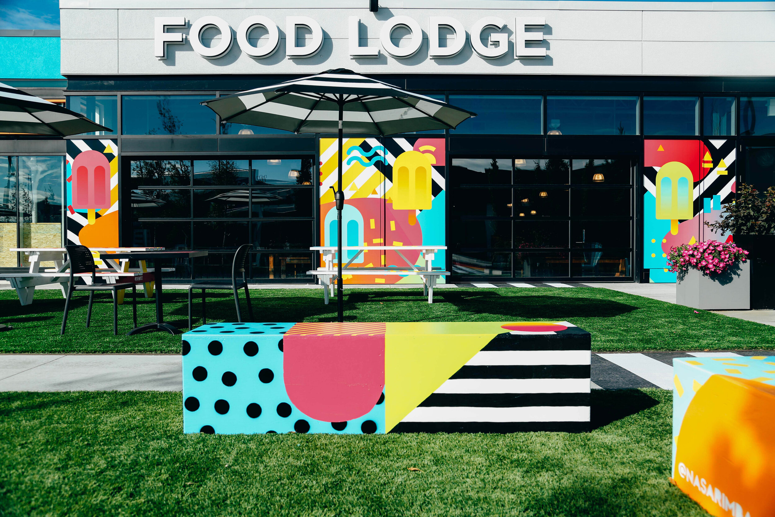 INTERACTIVE ART INSTALLATION AND PATIO SPACE OUTSIDE FOOD LODGE. PHOTO: DEERFOOT CITY