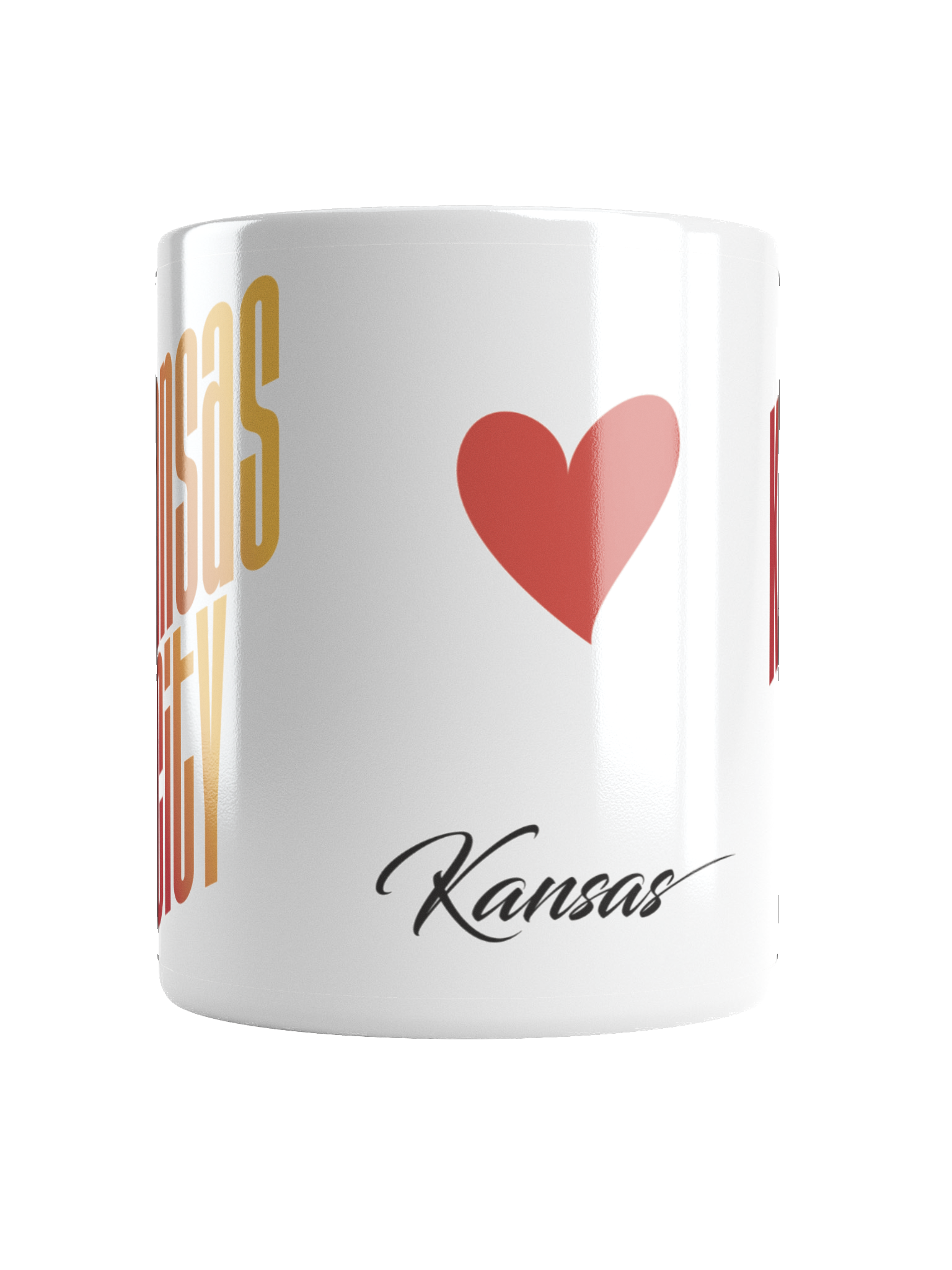 A white mug features a red heart, the word 'Kansas' in black script.
