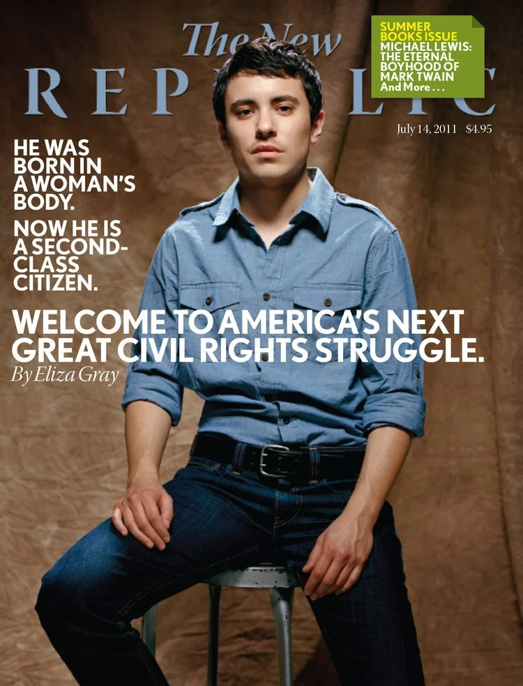 Magazine cover featuring a person in a blue shirt sitting on a stool with text related to civil rights and identity.