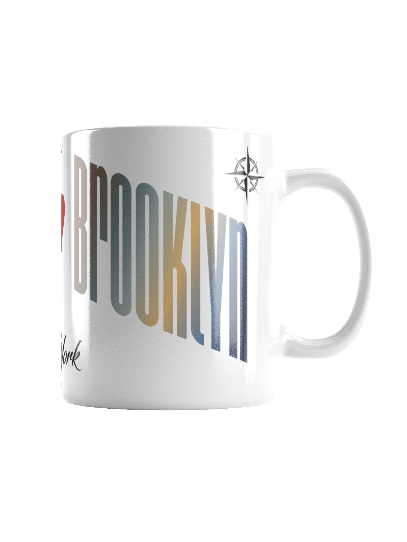 White ceramic mug with the word 'Brooklyn' in large multicolored letters, a black and gray compass symbol above the word, and a signature at the bottom.
