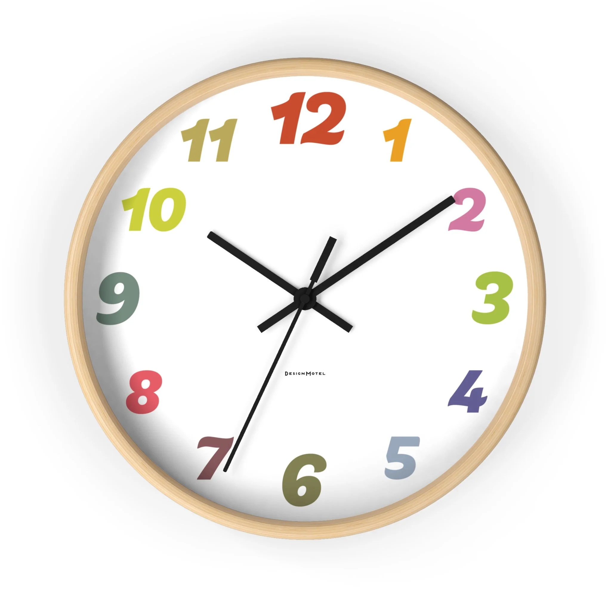 A round wall clock with a light wooden frame, white face, and multi-colored numbers. The black hour and minute hands indicate the time as 10:10, and the black second hand points to 7.