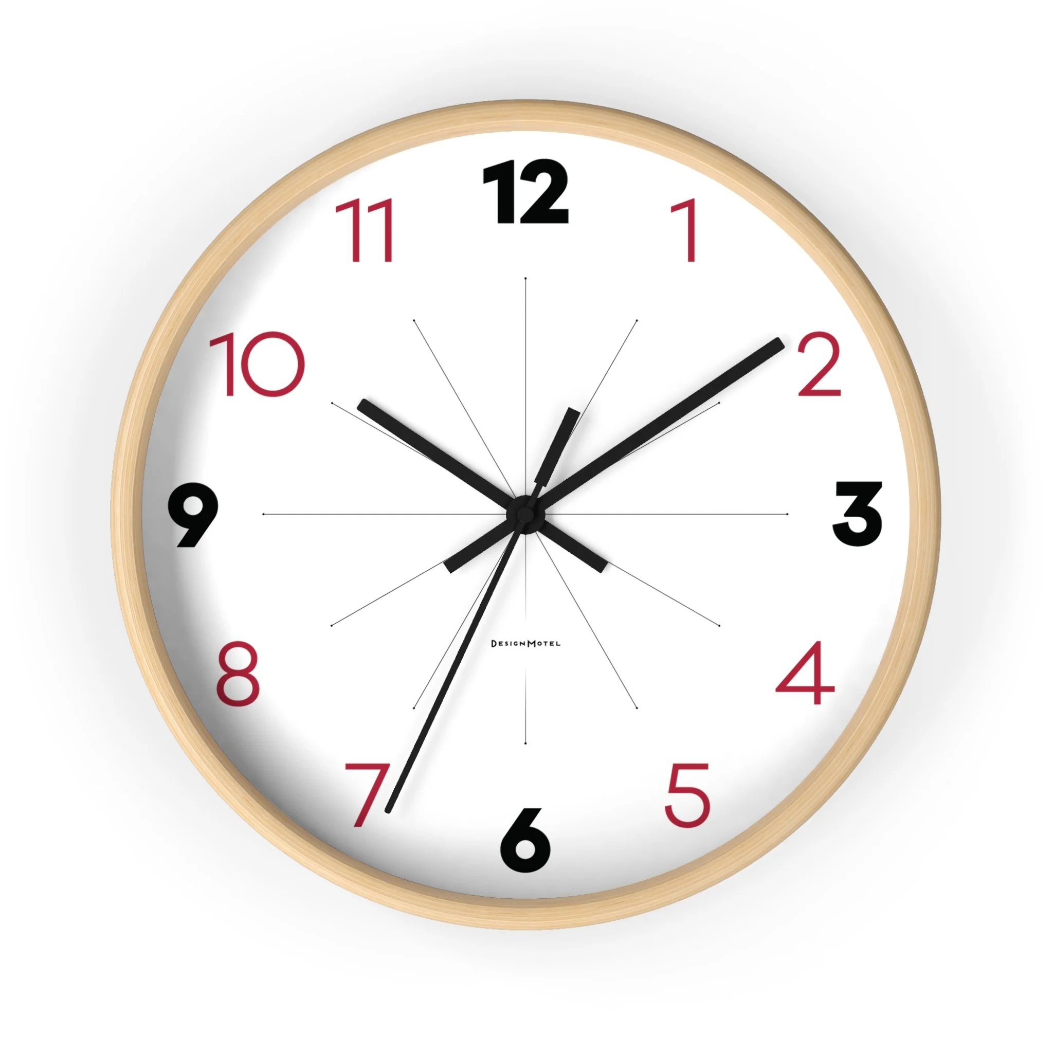 A round wall clock with a light wooden frame, white face, black and red numbers, and black hour, minute, and second hands showing the time as 10:10:36.