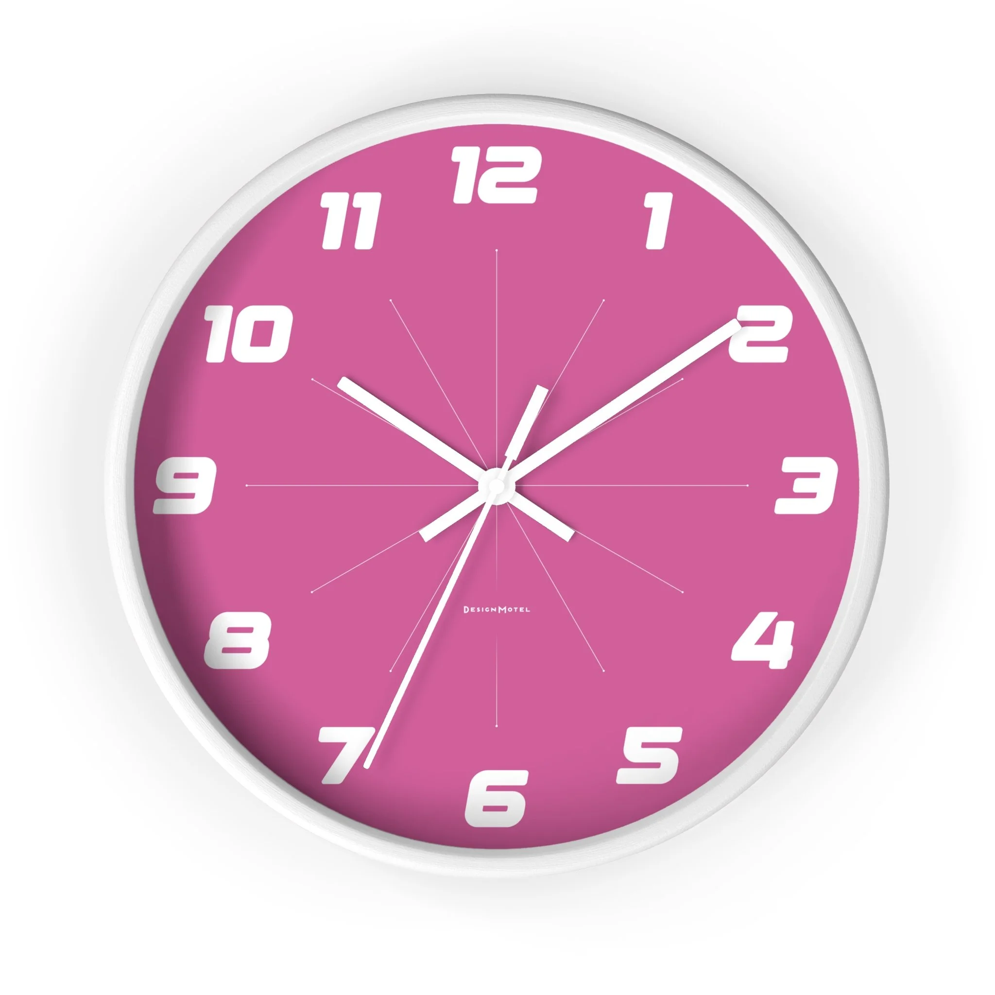 Pink wall clock with white frame and large numbers indicating hours, showing the time as 10:11:37.