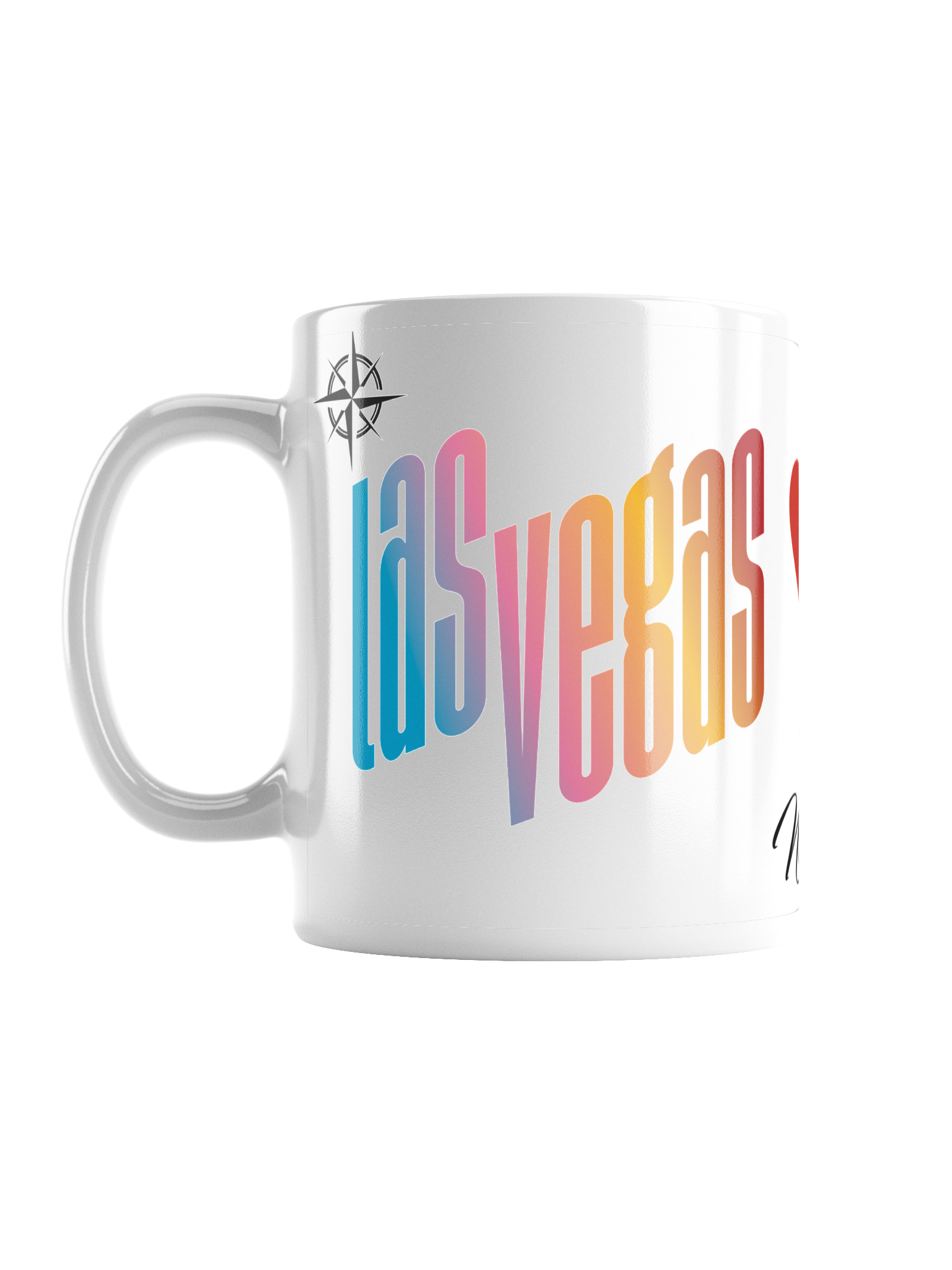 A white ceramic mug with a colorful, stylized text design that reads 'Las Vegas' in large, bold, letters. The mug also features a small compass symbol near the handle.
