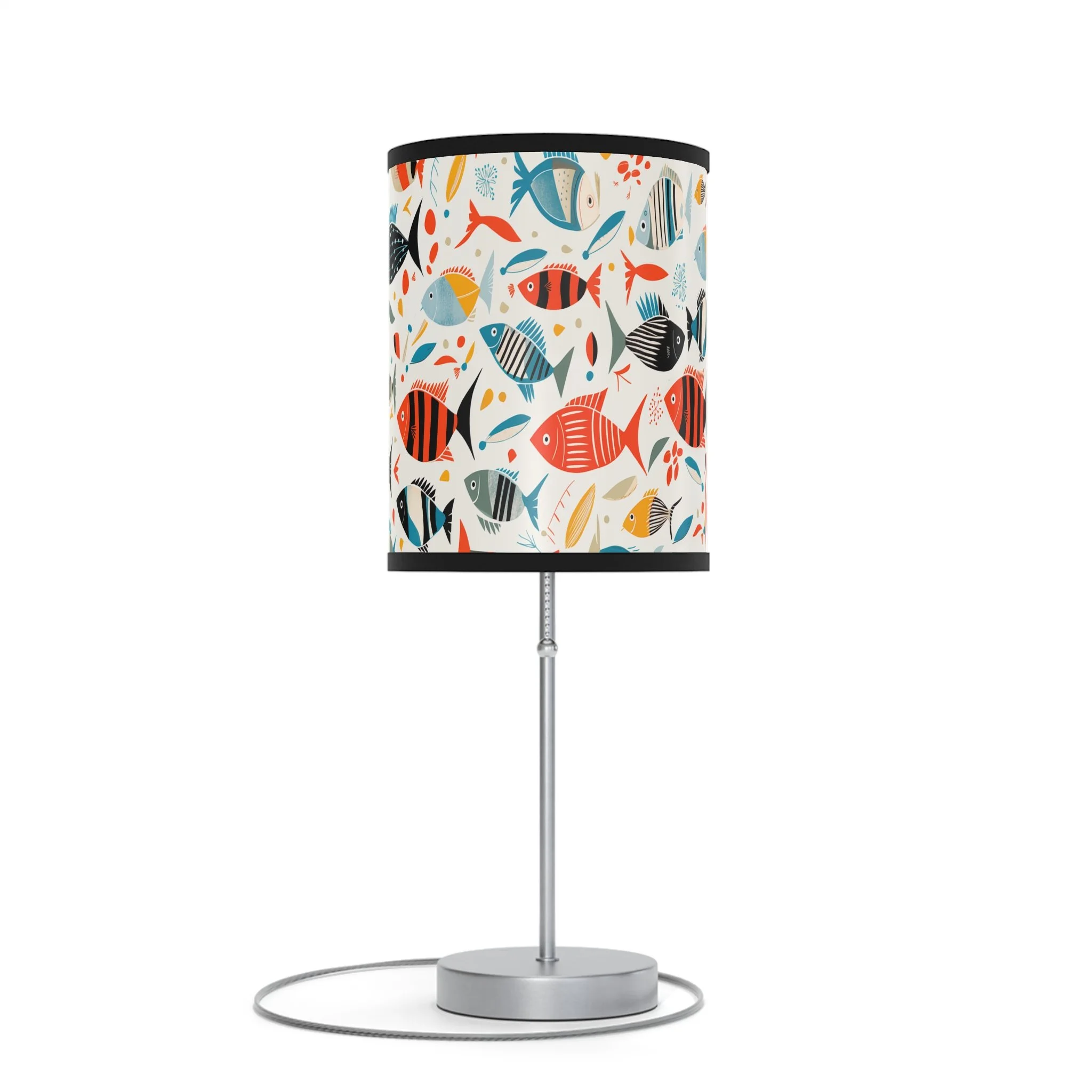 Table lamp with a shade decorated with colorful fish illustrations.