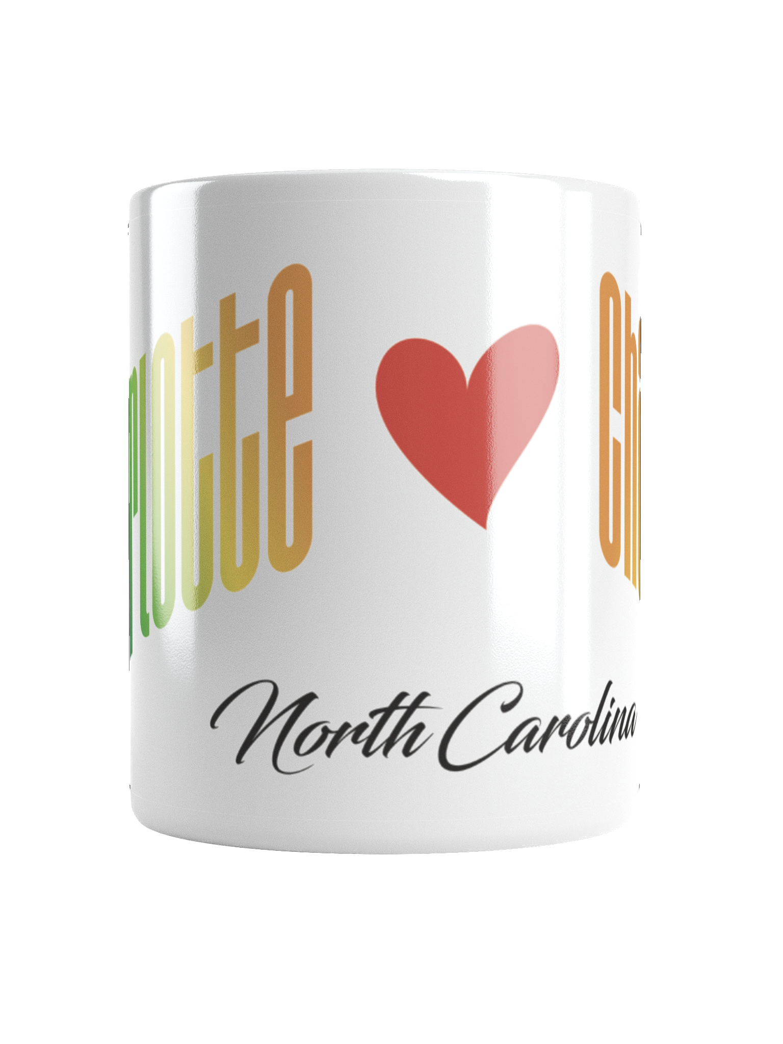 A white mug with the heart symbol ❤️ and 'North Carolina' in a script font, featuring gold, green, and red graphics.