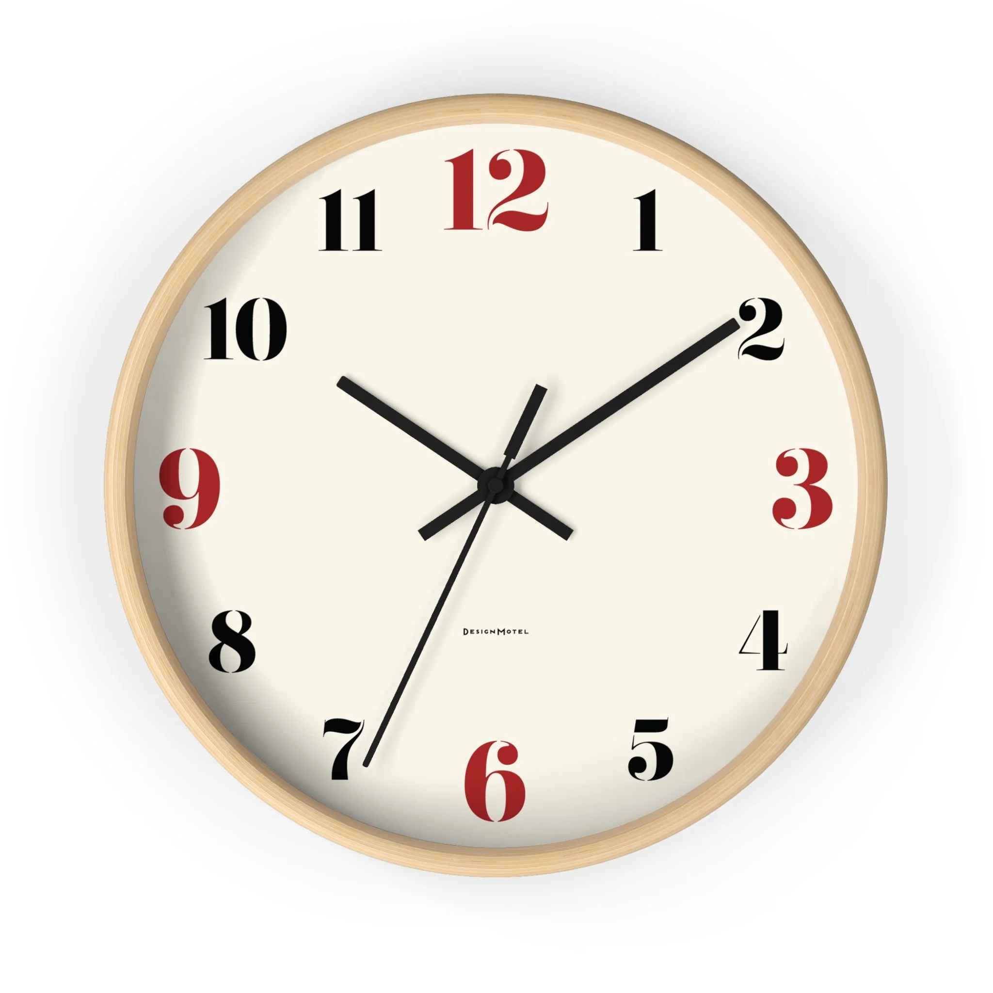 Round wall clock with a light wood frame, cream face, black and red numbers, and black hour, minute, and second hands showing 10:10:34.