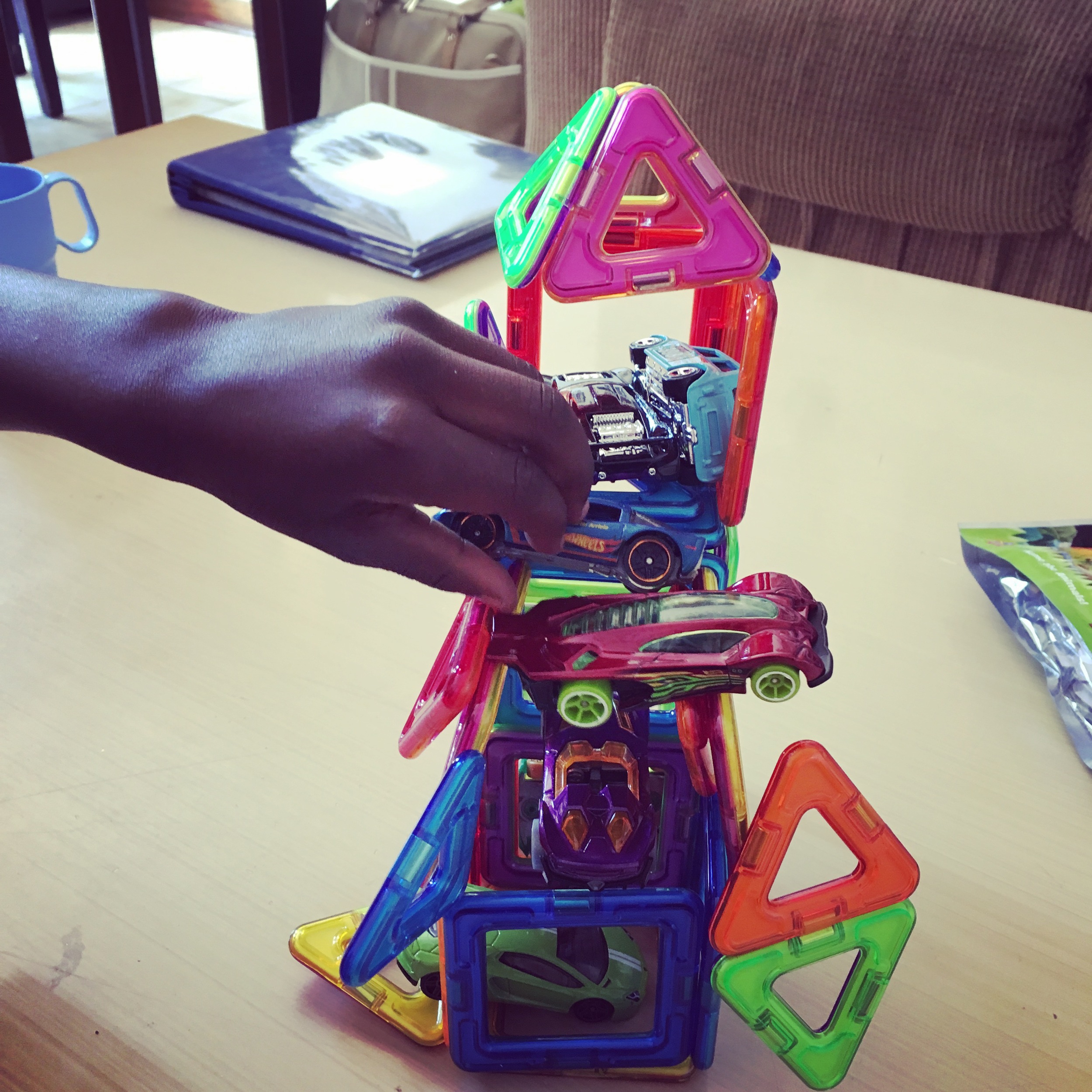 Building garages for his cars.