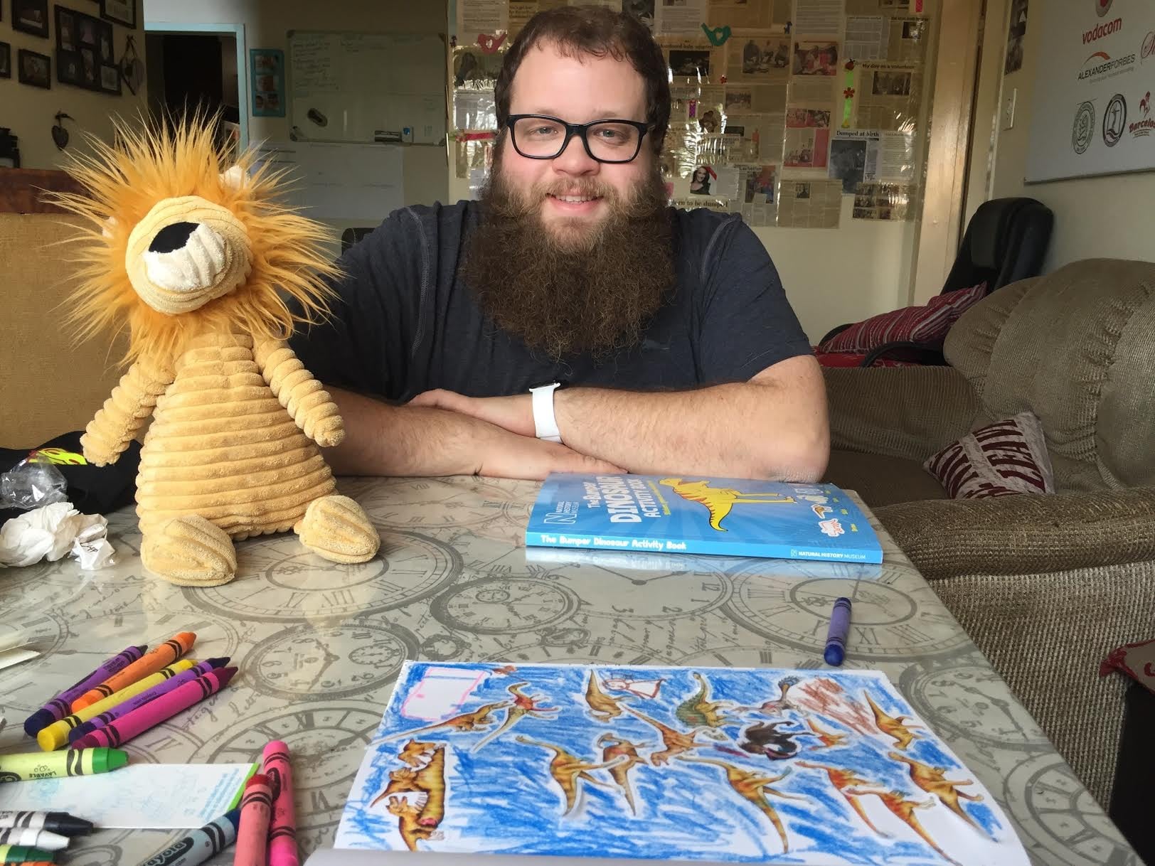 Photo of T's art, Roy, and Brian courtesy of T.