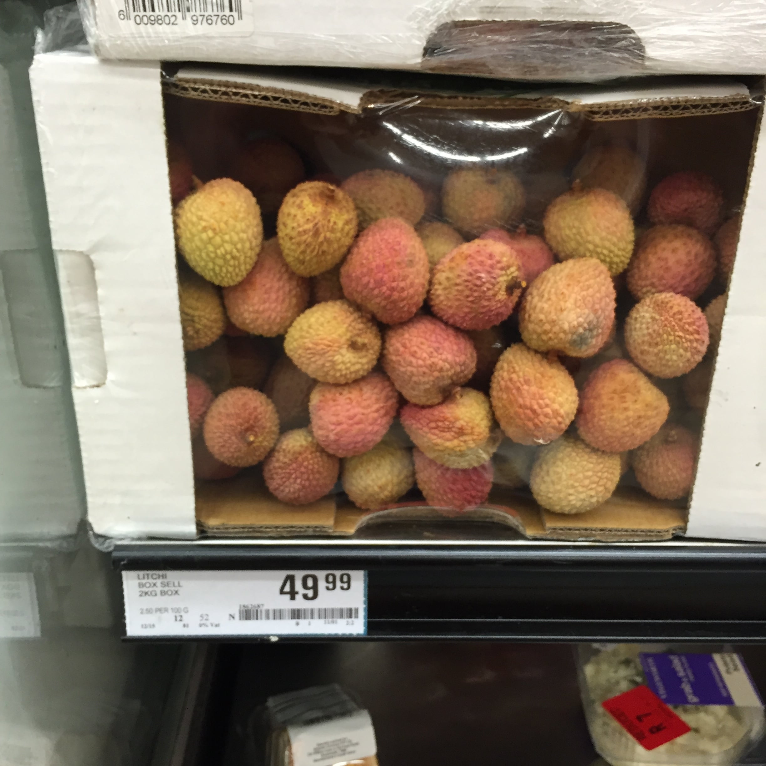 This wasn't the snack today, but a fruit (??) called litchi T shared with us a couple of days ago. Neither of us had had it before, so T enjoyed being the one to show us how to eat it. Note: R49.99=about $2.50