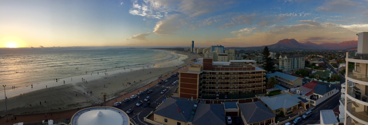 Brian's panoramic photo of the sunset, the skyline, and the mountains.