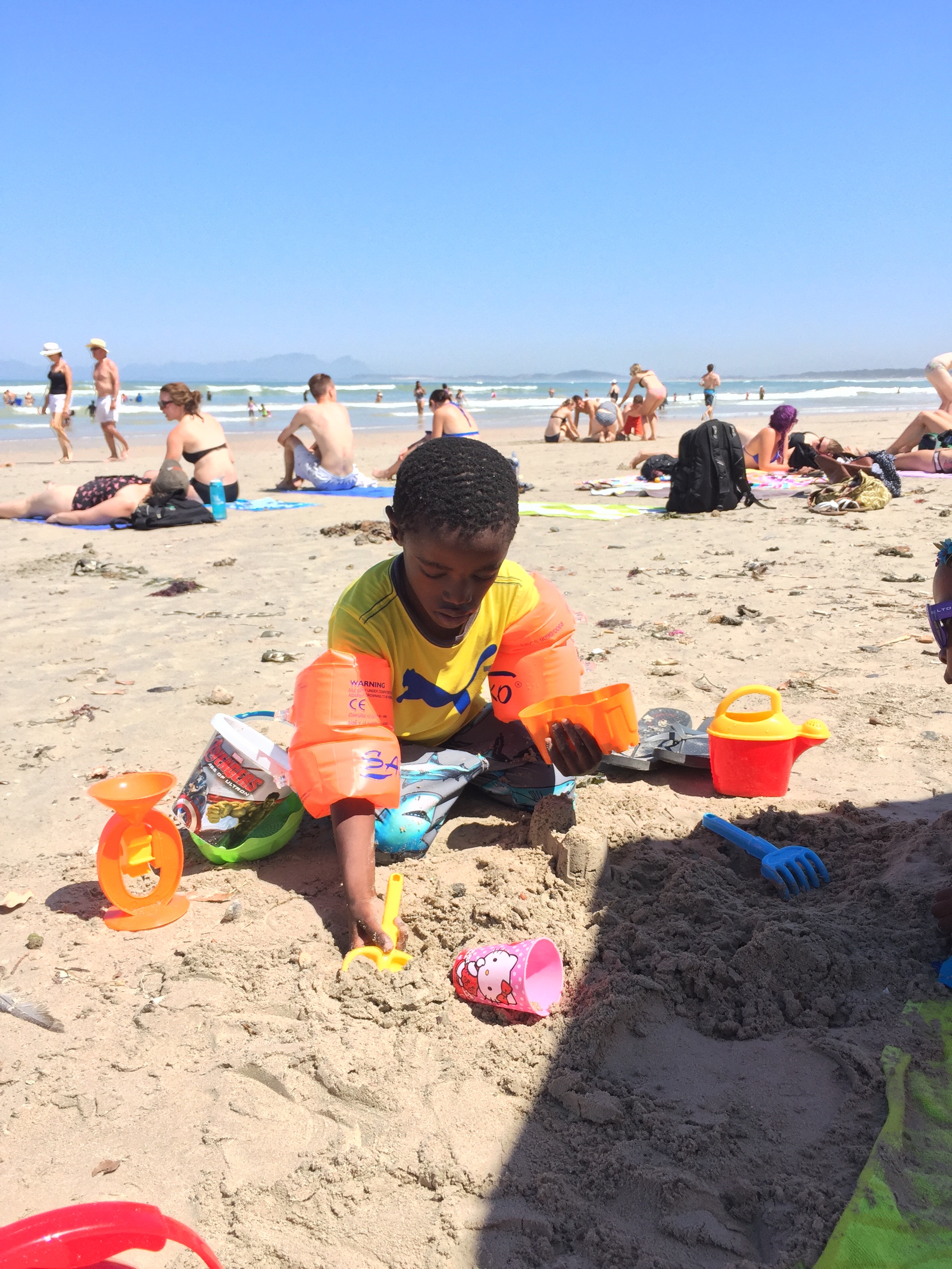 Hard at work building sand castles.