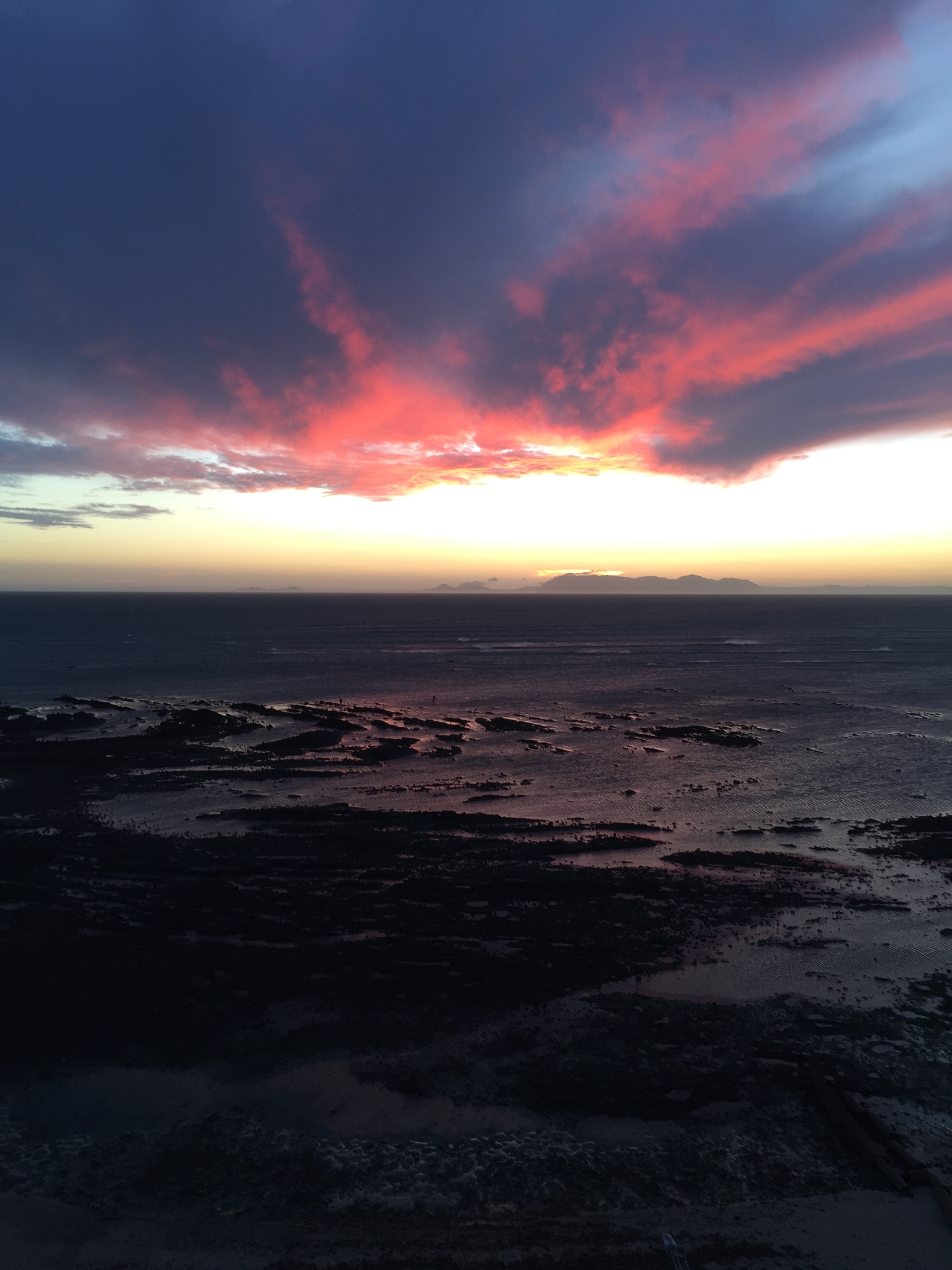 I got a little carried away taking photos of the sunset tonight. It was beautiful. I loved how the pink of the clouds was reflected in the water.