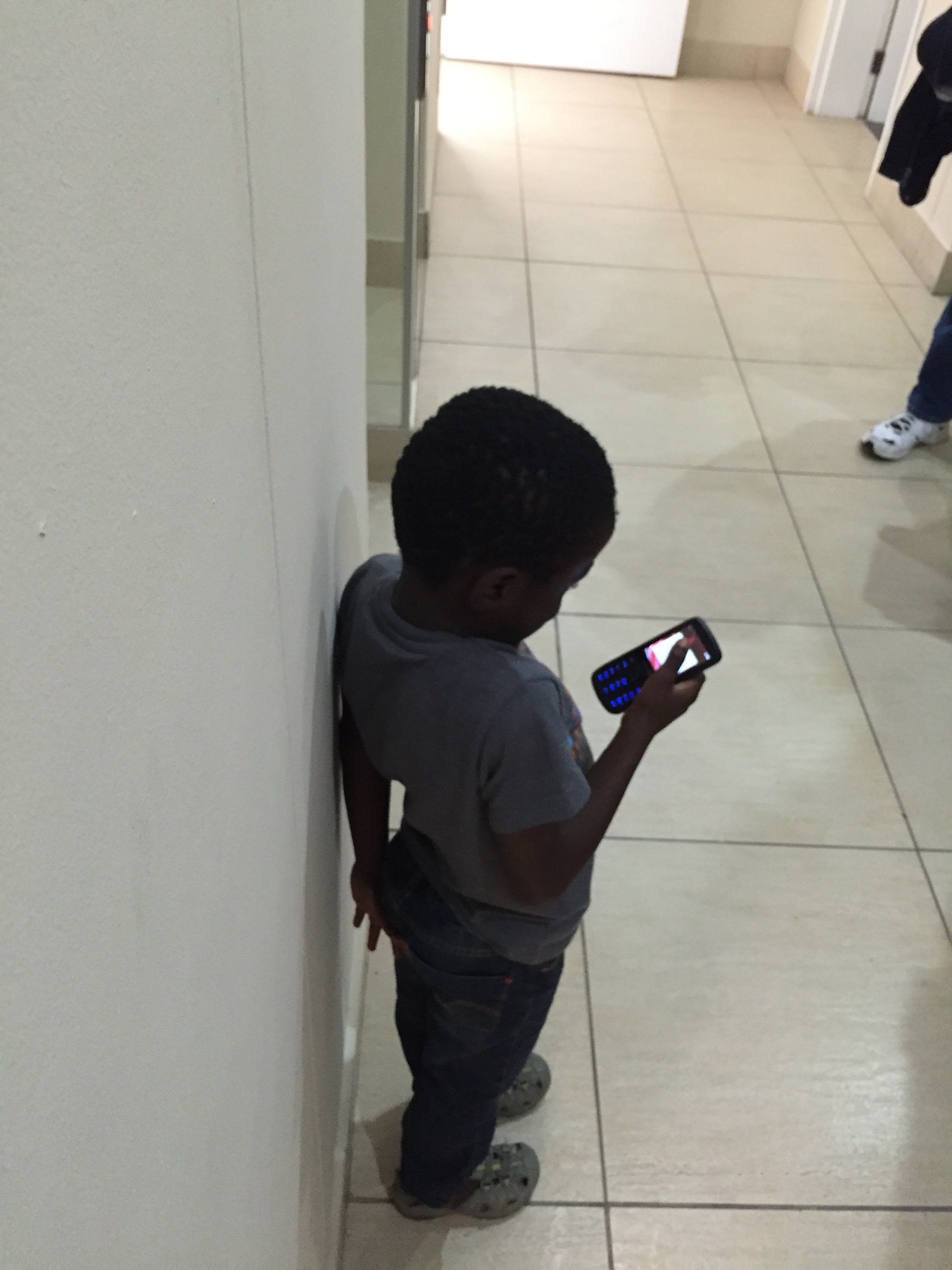 Tisetso playing with his new phone (the phone Grandma and Grandpa Malcolm used while visiting us).