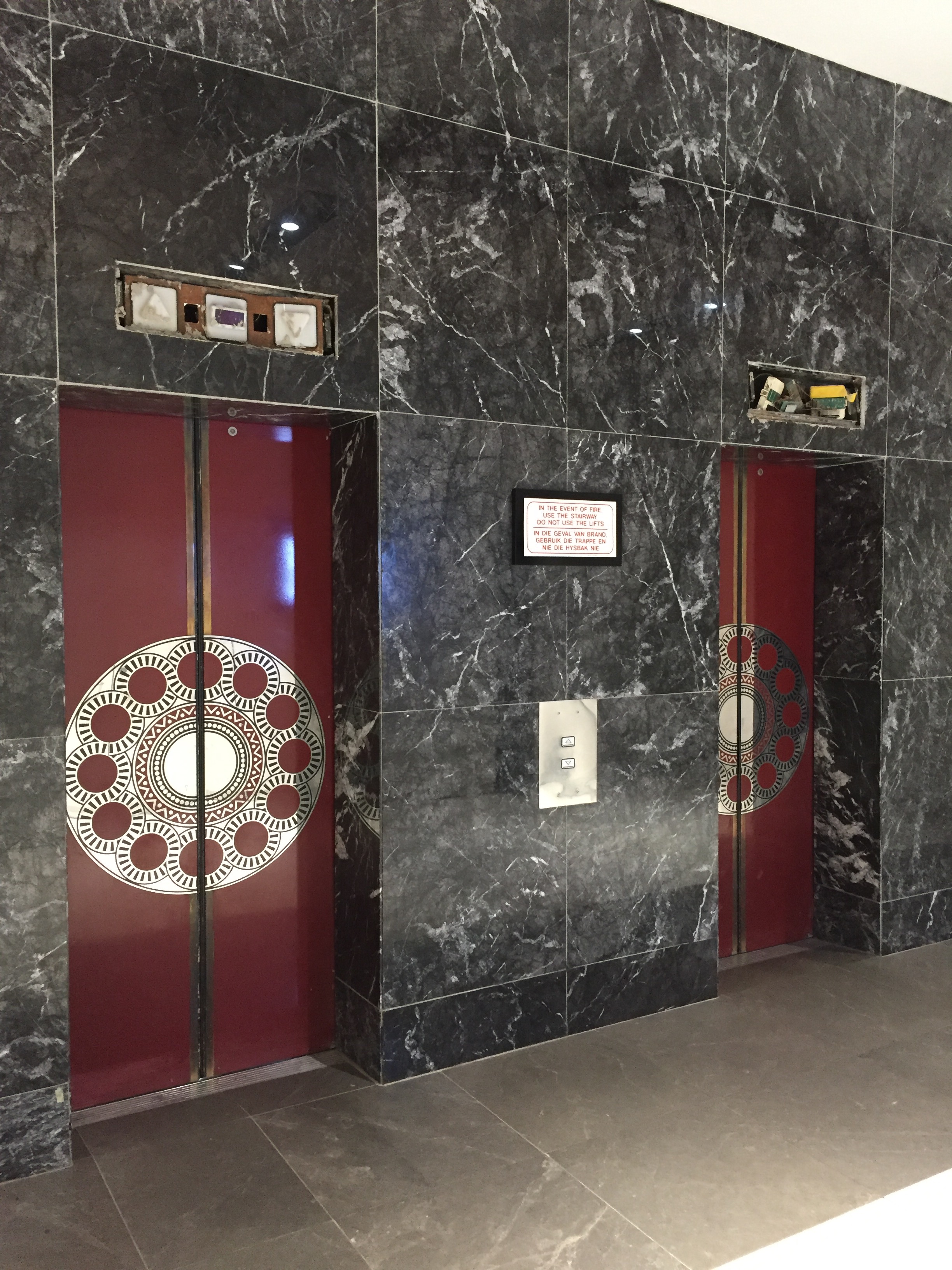 These are the elevators we got stuck on. Note the broken indicators on the top!