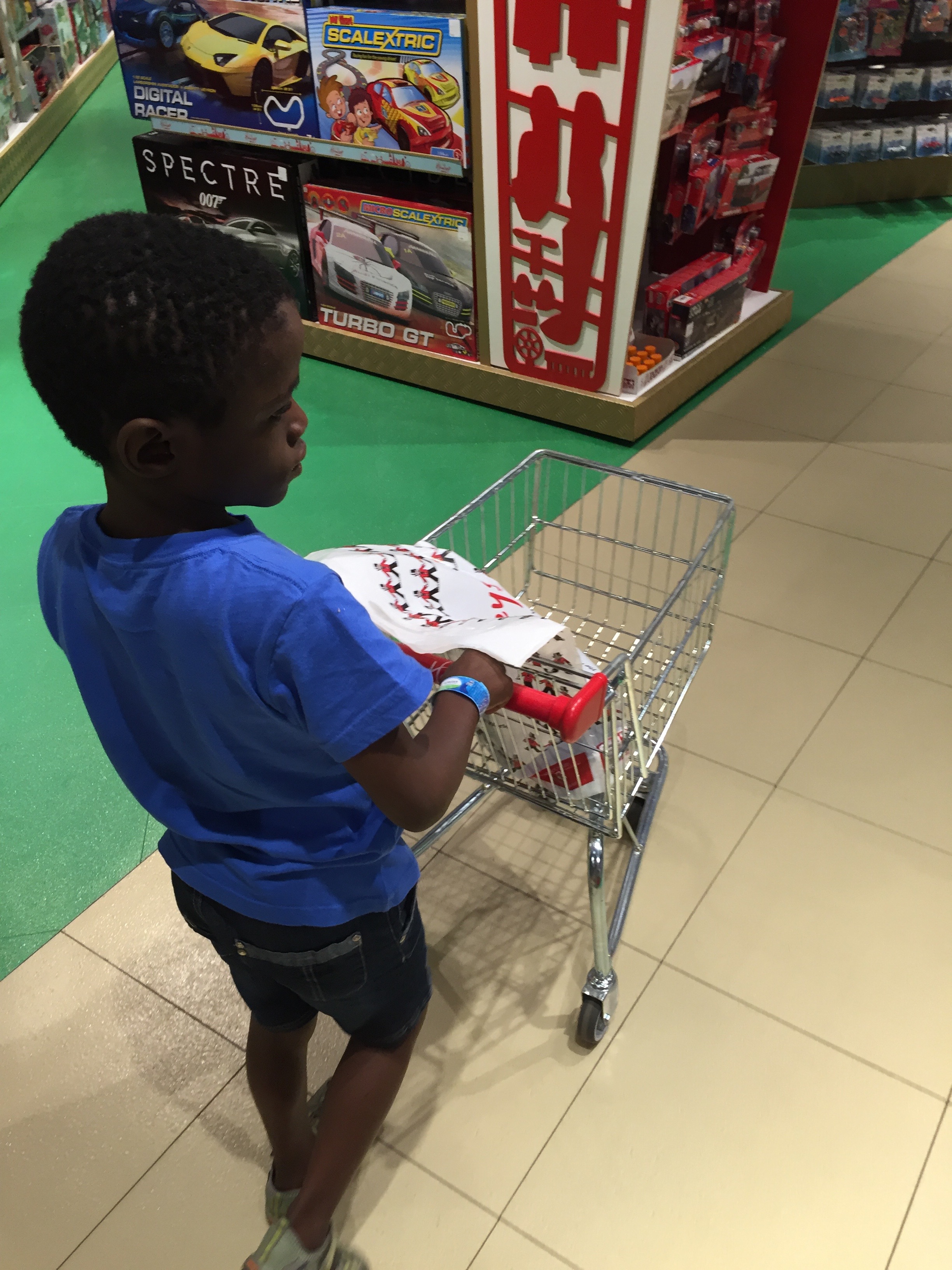 Walking with his purchases.