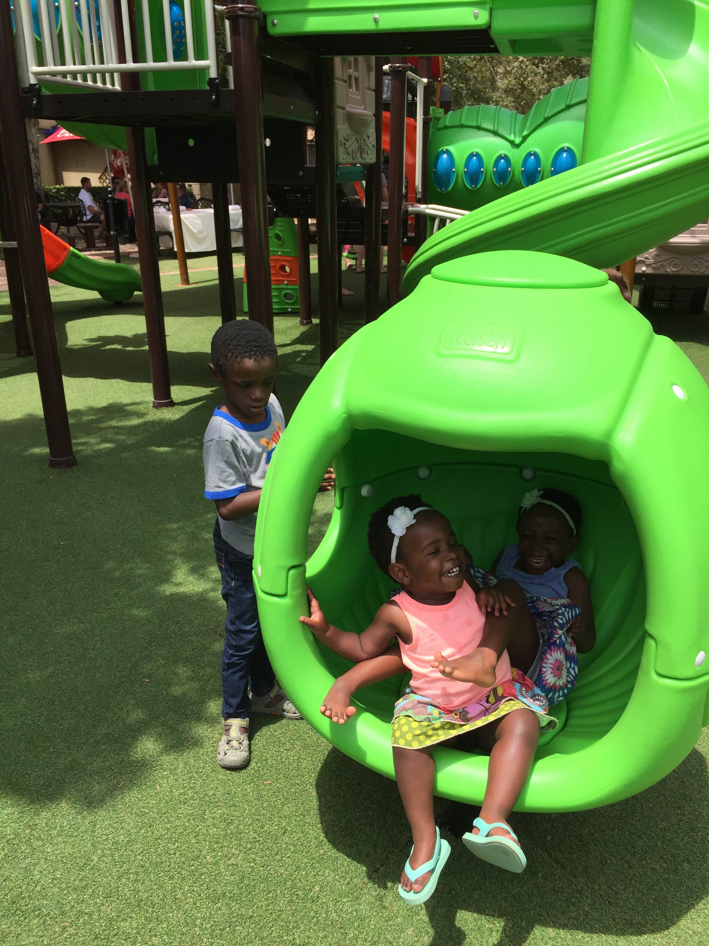 Look at these beautiful girls and their smiles! Love them! Tisetso (not smiling) was spinning them around and around, prompting the smiles.