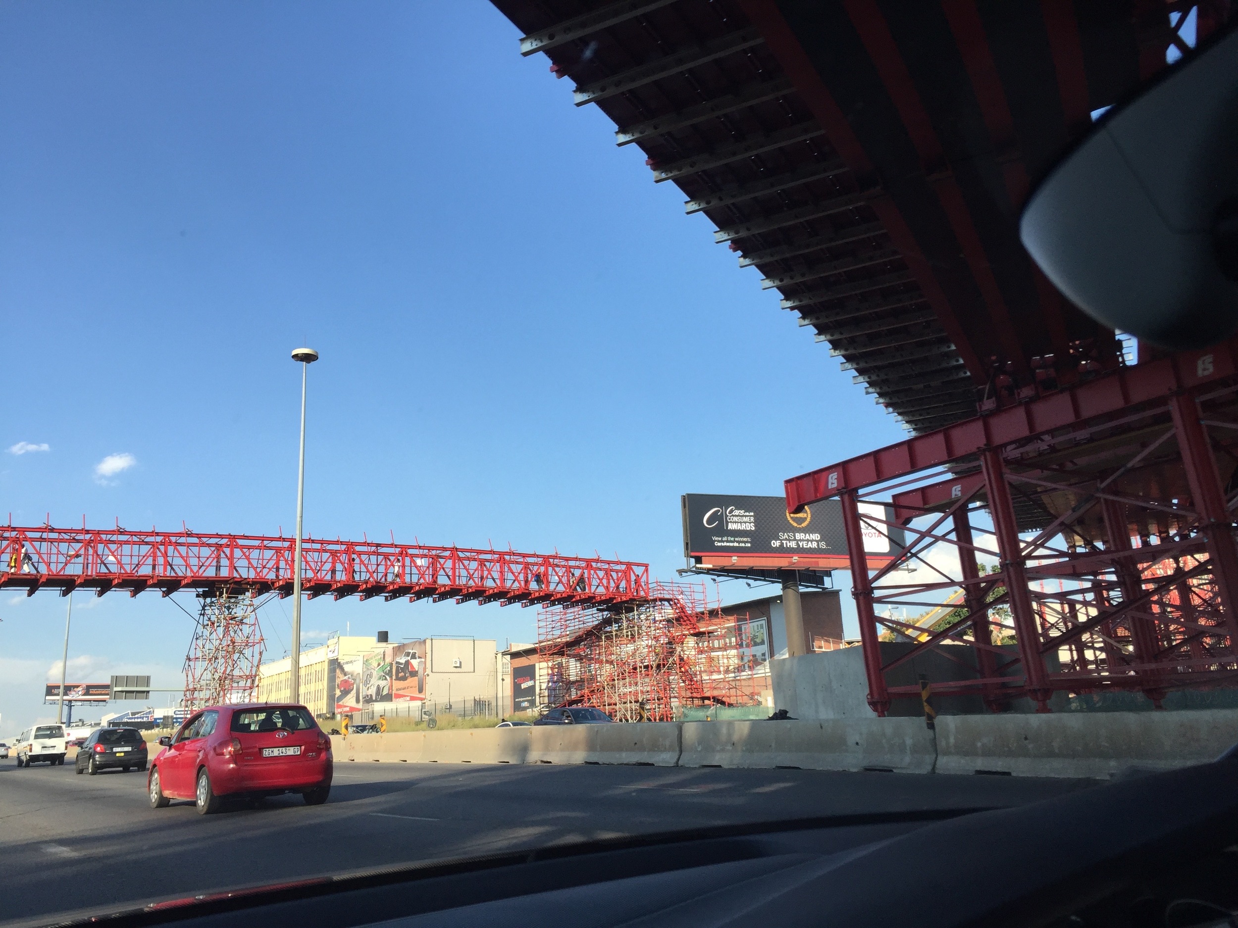 A walkway bridge made out of scaffolding. Eeek!!!
