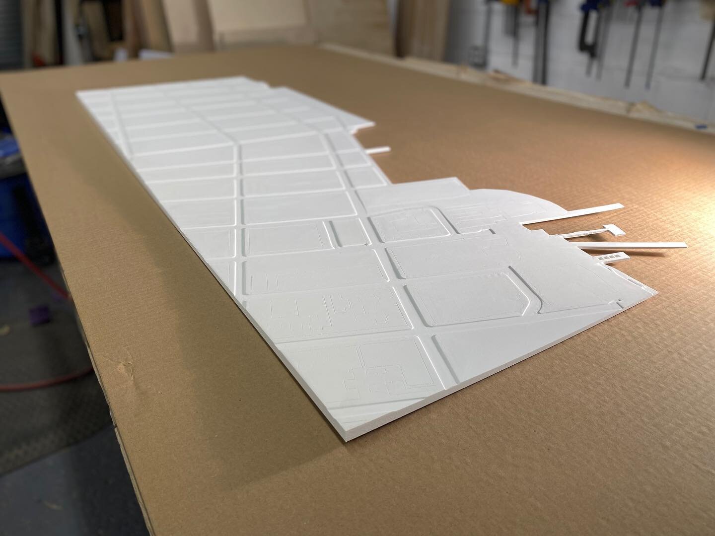 Some more PVC magic on this 3D milled topography with docks and street grid. Sintra comes in a variety of thicknesses and is a relatively cheap option for CNC cutting high res models. Email use at cnc@thirdkindstudio ! 👽