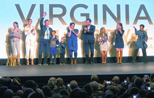 Cast members gather on stage at the premiere of Big Stone Gap at the Paramount Theater in Charlottesville, Virginia to open the Virginia Film Festival. (Photo courtesy of Sanjay Suchak/University of Virginia)