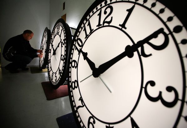 PHOTO: National Geographic - news.nationalgeographic.comPhoto of a man adjusting giant clocks. Peter Shugrue checks a clock at the Electric Time Company factory in Medfield, Massachusetts, on March 8, 2013.