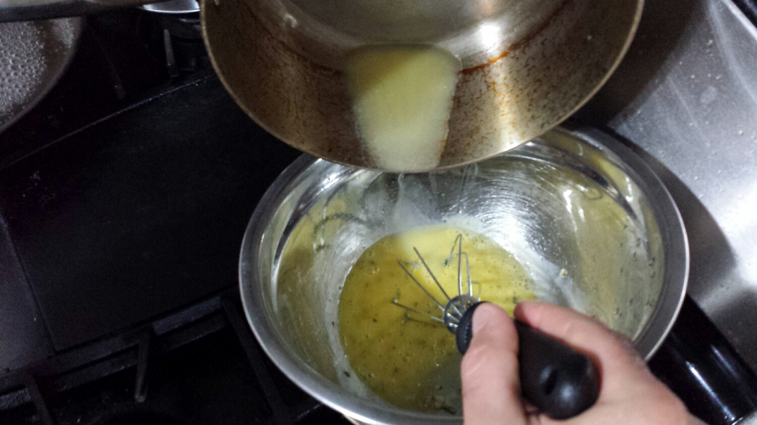 When the butter is melted slowly add it to the egg/South of France mixture whisking over the double boiler until the mixture has thickened and doubled in size. You may add a pinch of sugar and salt if you wish.