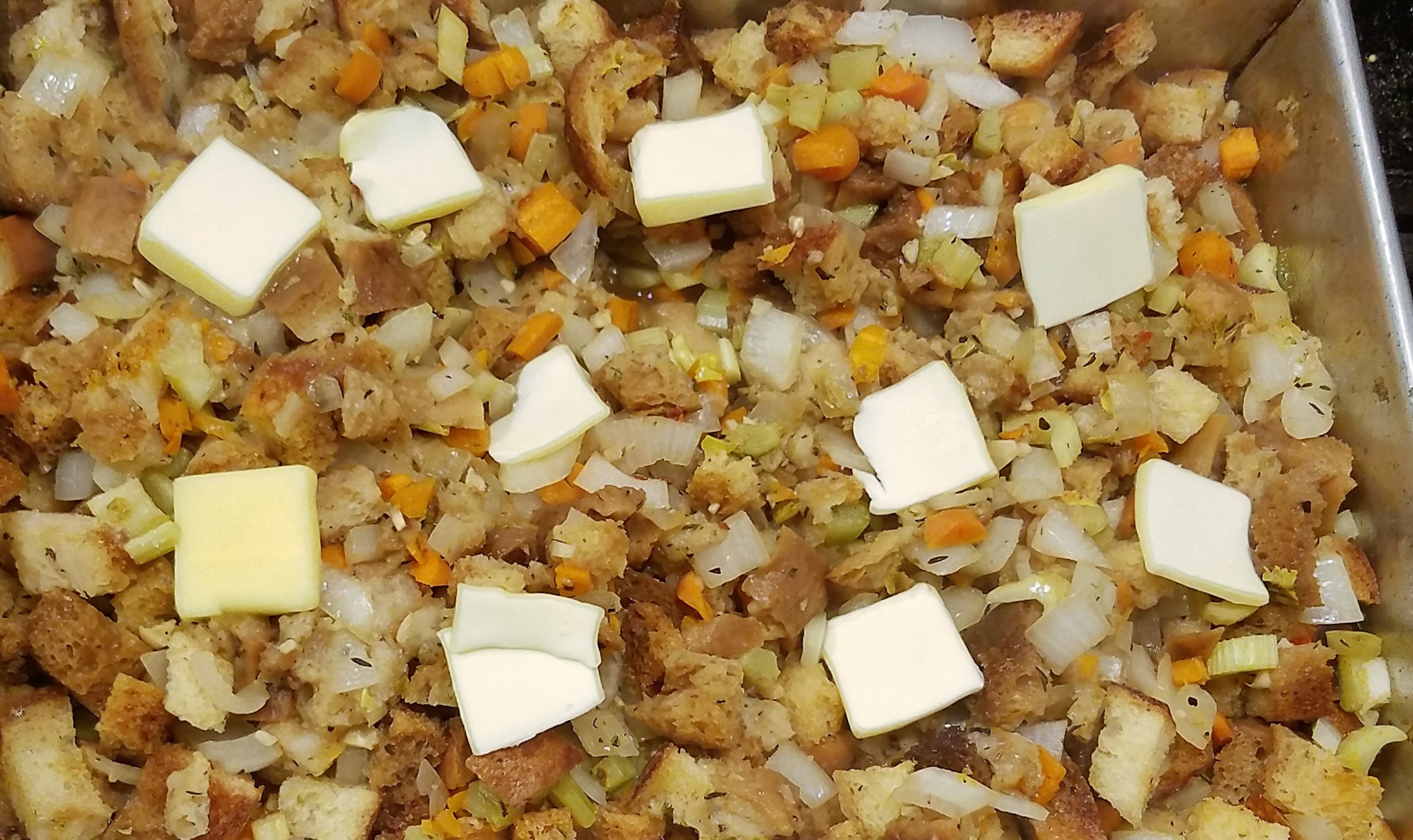 Before returning to the oven to brown.