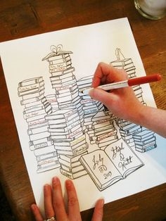 How perfect is this guest book alternative? Get your guests to sign a spine of a book that you can frame and keep.