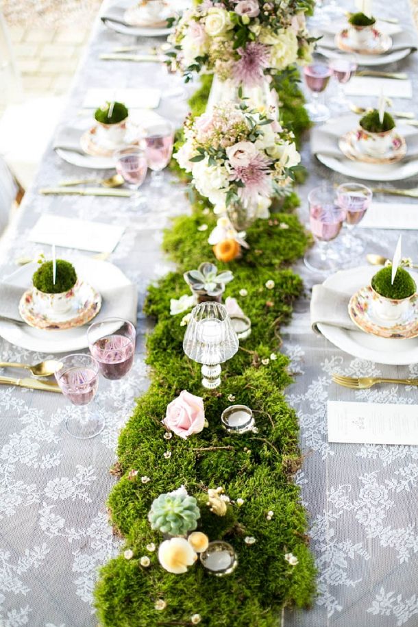 Love the look of lace against the wood & greenery.