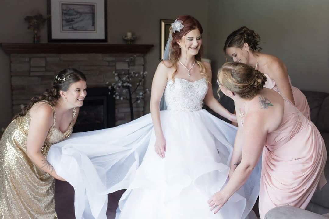 Gown and Blush Maids dresses from Once Upon A Time Weddings.