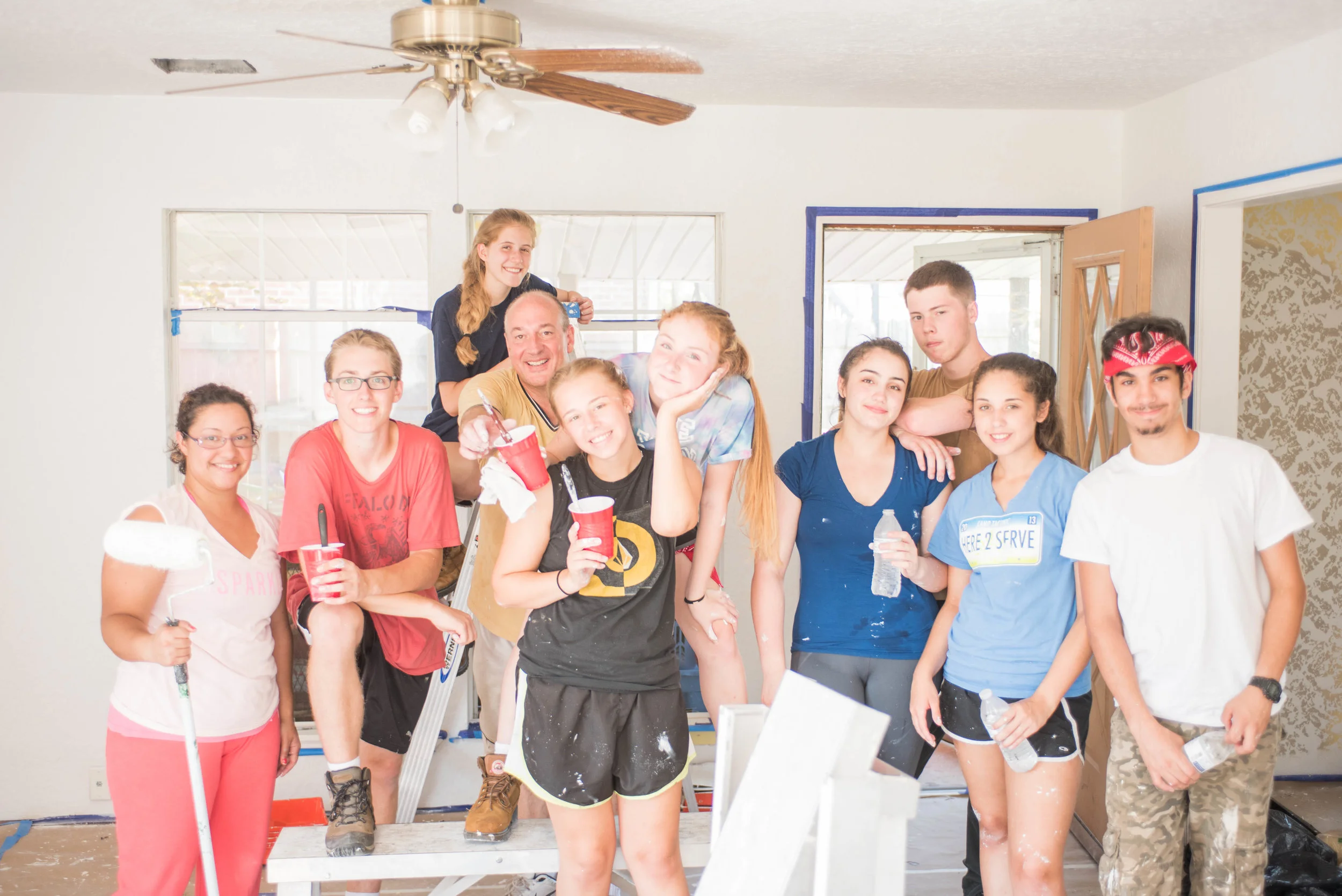 Serve More volunteers repair the interior of an Oklahoma City home after flood and tornado damage.