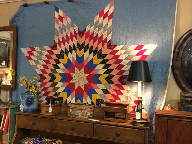This was the first thing I saw when I turned the corner. I'm really into quilts, but usually not the traditional sort like this. But for some reason, the Americana feel and the colors and starburst design was really striking to me.