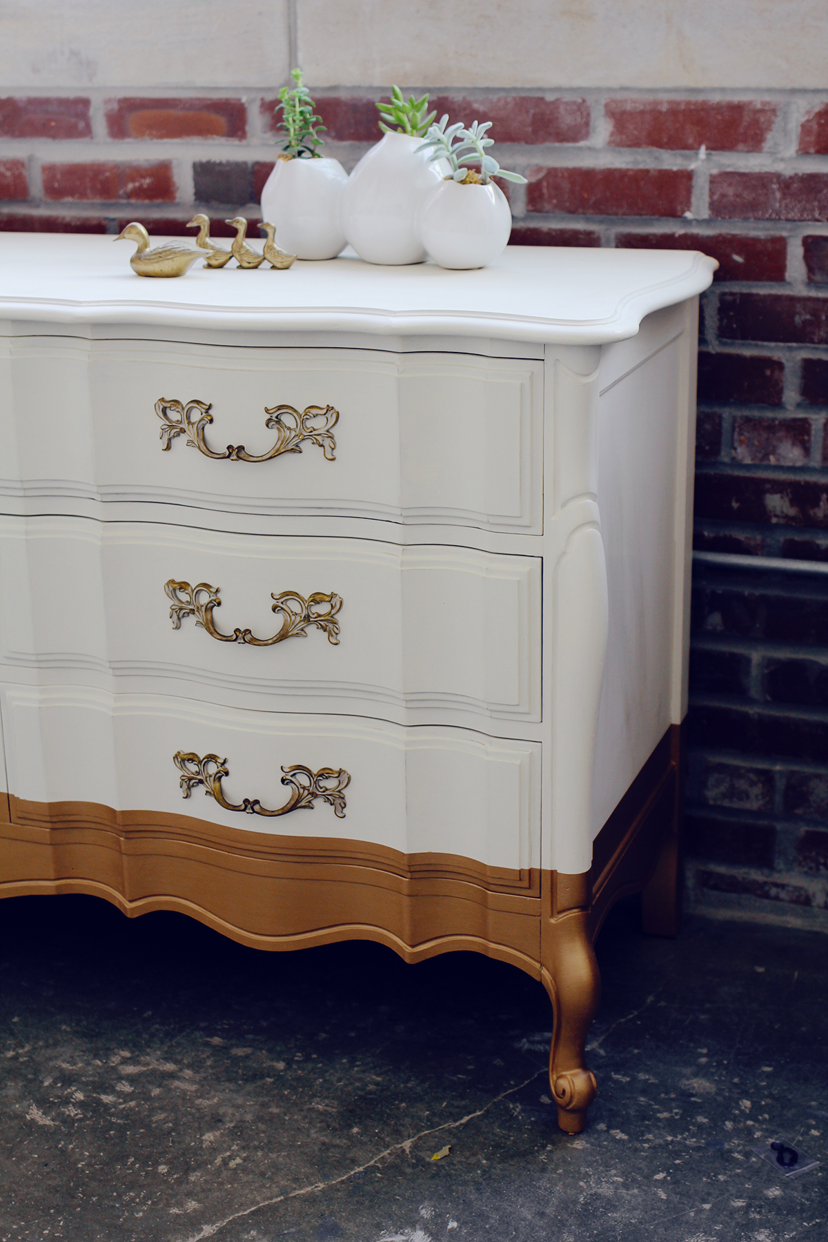 A Modern Take On French Provincial White Dresser Dipped In Gold