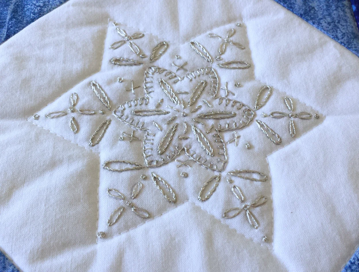 Table Runner snowflake stitched with Cosmo Nishikiito floss.