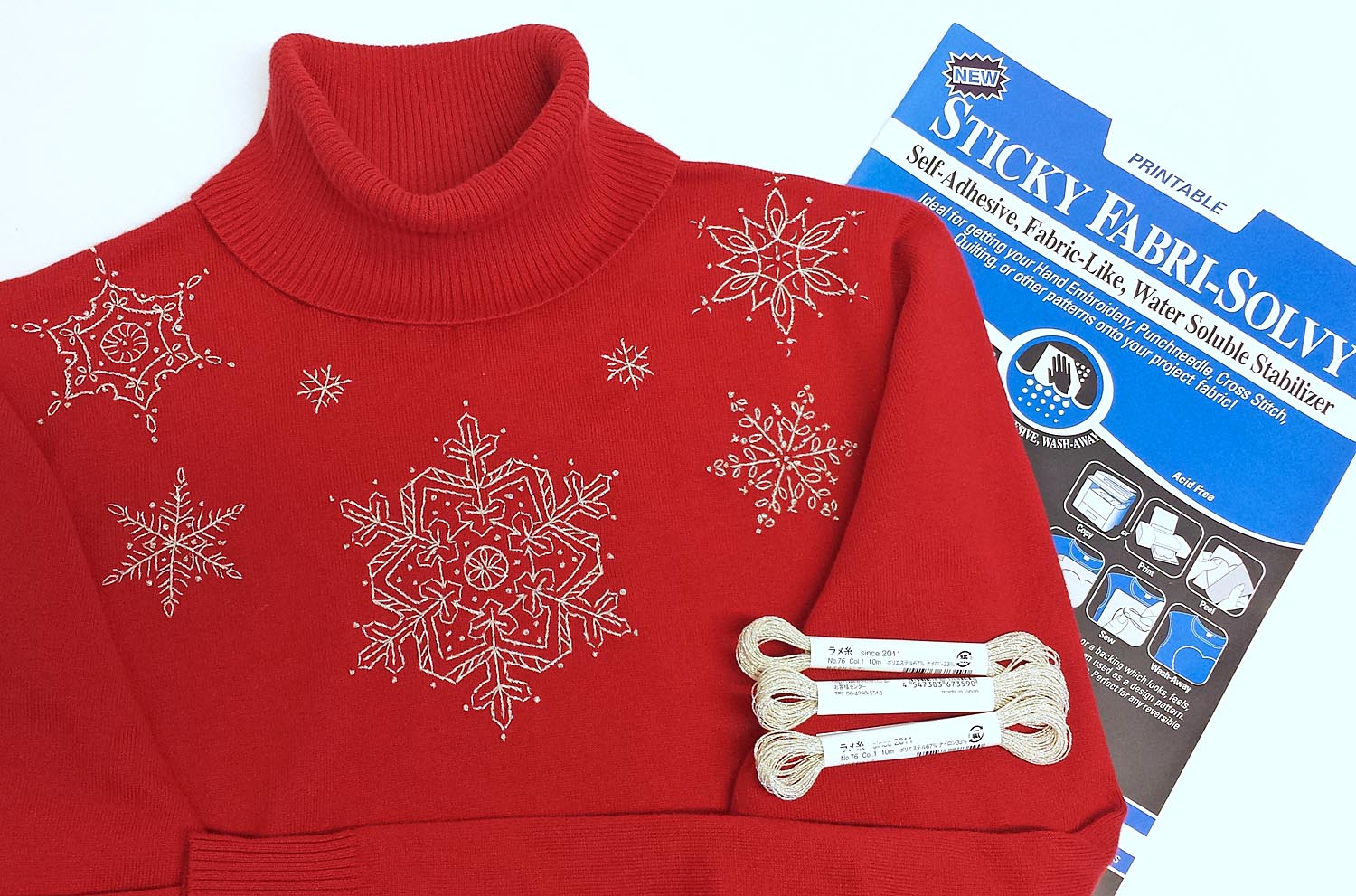 Snowflakes embroidered onto clothing a sweater.