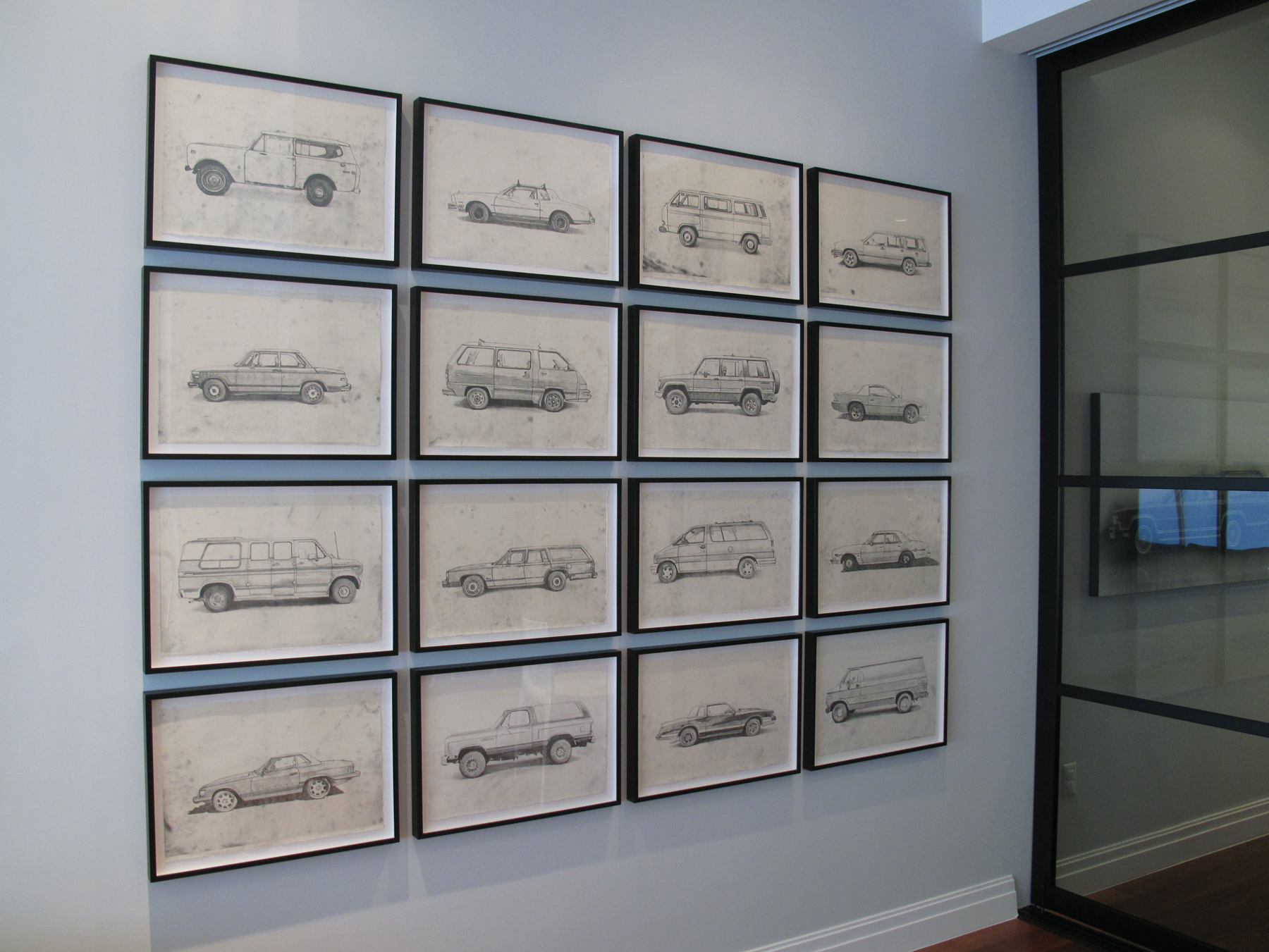 Installation of 16 framed car drawings