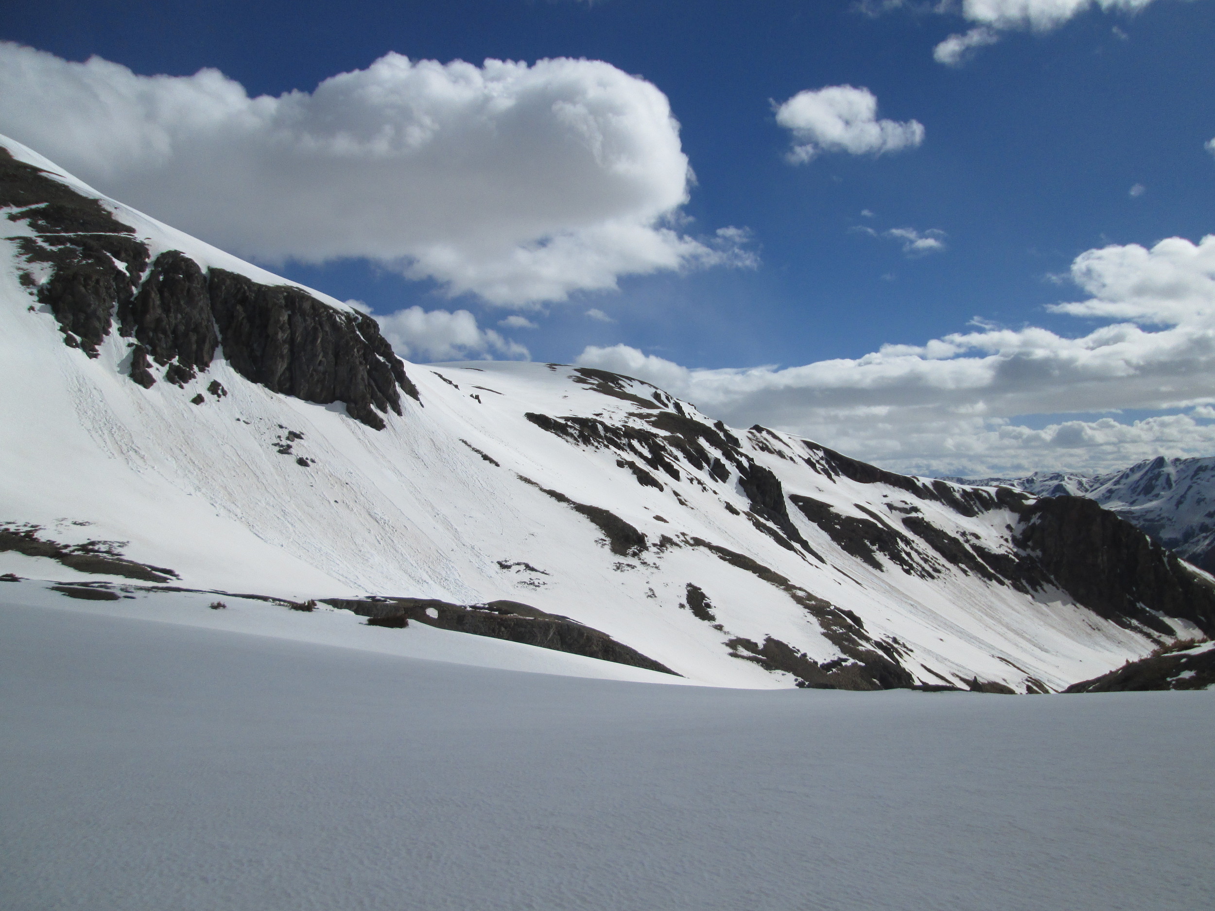 On south and southeast aspects in Senator Beck Basin, absorption of solar energy in dust layer D8 produced enough melt to initiate extensive “wet-loose” avalanches scouring down to the underlying merged D3-7 dust layer. 