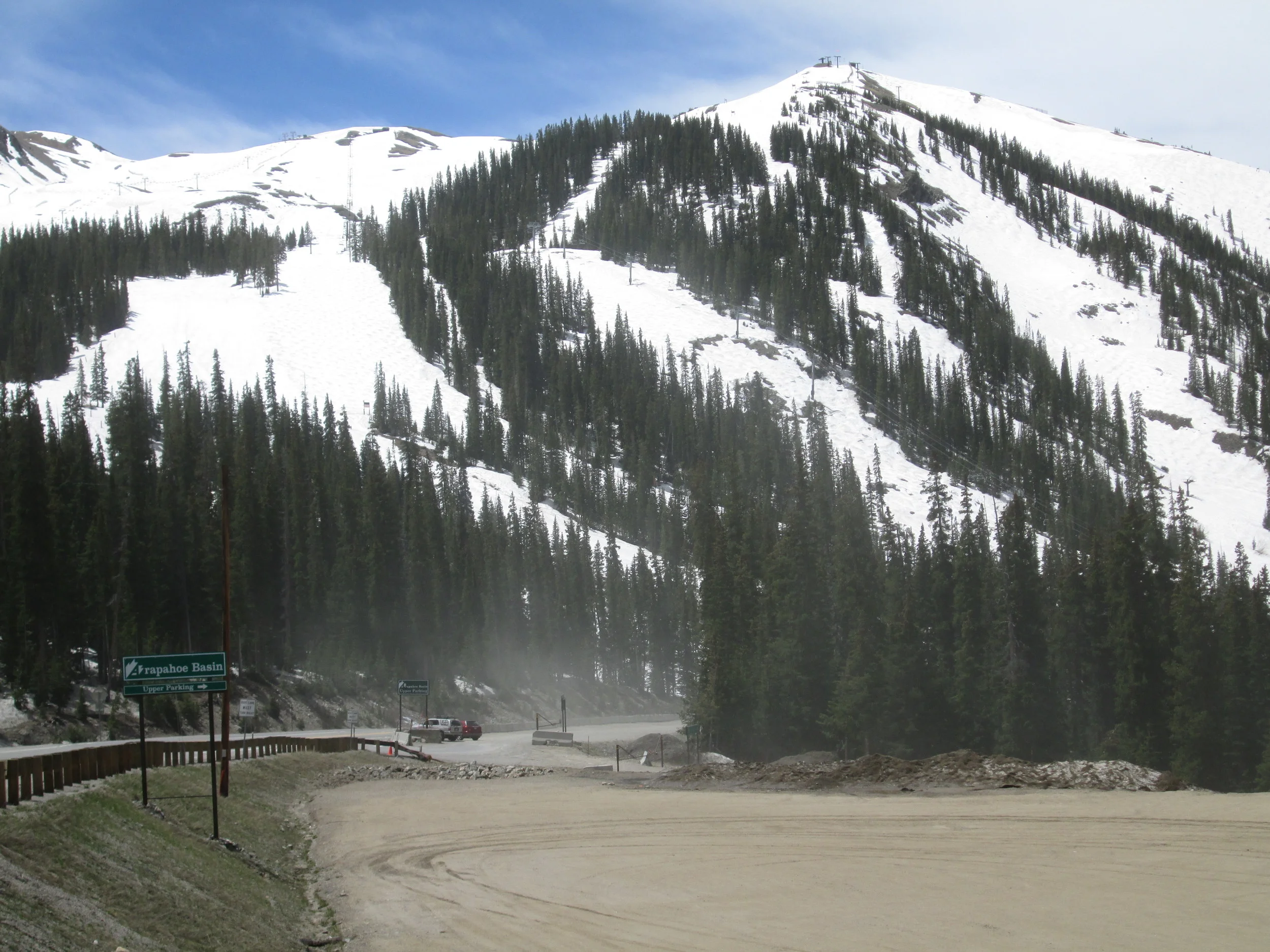 During this site visit, blustery winds occasionally produced blowing dust from the nearby Arapahoe Basin gravel parking lots. A sample of dirt was collected from the parking area, for comparison to the ‘local’ materials (i.e., the non-desert dust) found in the ‘all layers merged’ sample collected in spring 2013. 