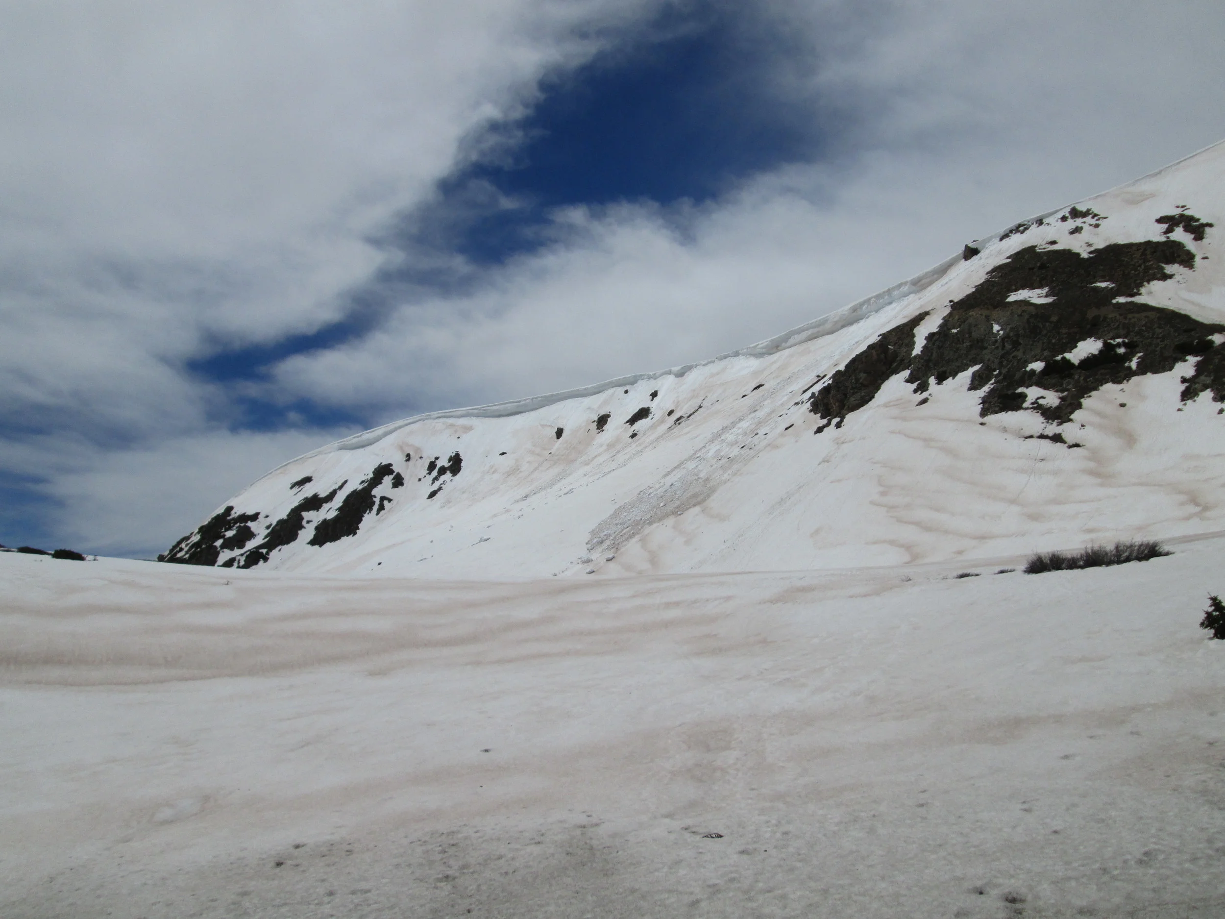 Dust-in-snow was rapidly re-emerging above treeline, here on the west side of Loveland Pass.