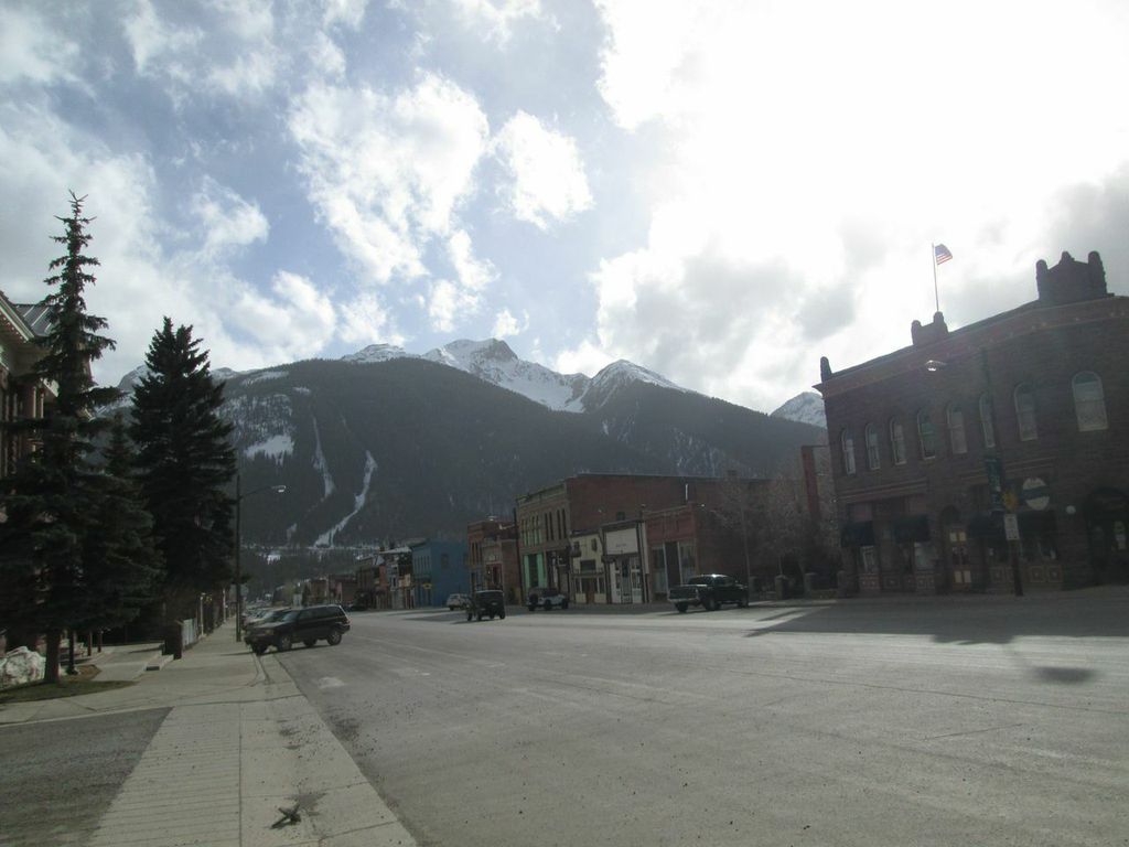 Looking south down Silverton’s main Greene Street at Sultan Mountain (13,368’) in the distance, at 5 PM on Wednesday afternoon, April 8. Dust reduction in visibility was apparent but quite minor when compared to dust storms that completely obscure Sultan Mountain and its forested slopes from this vantage point in front of CSAS’s office.