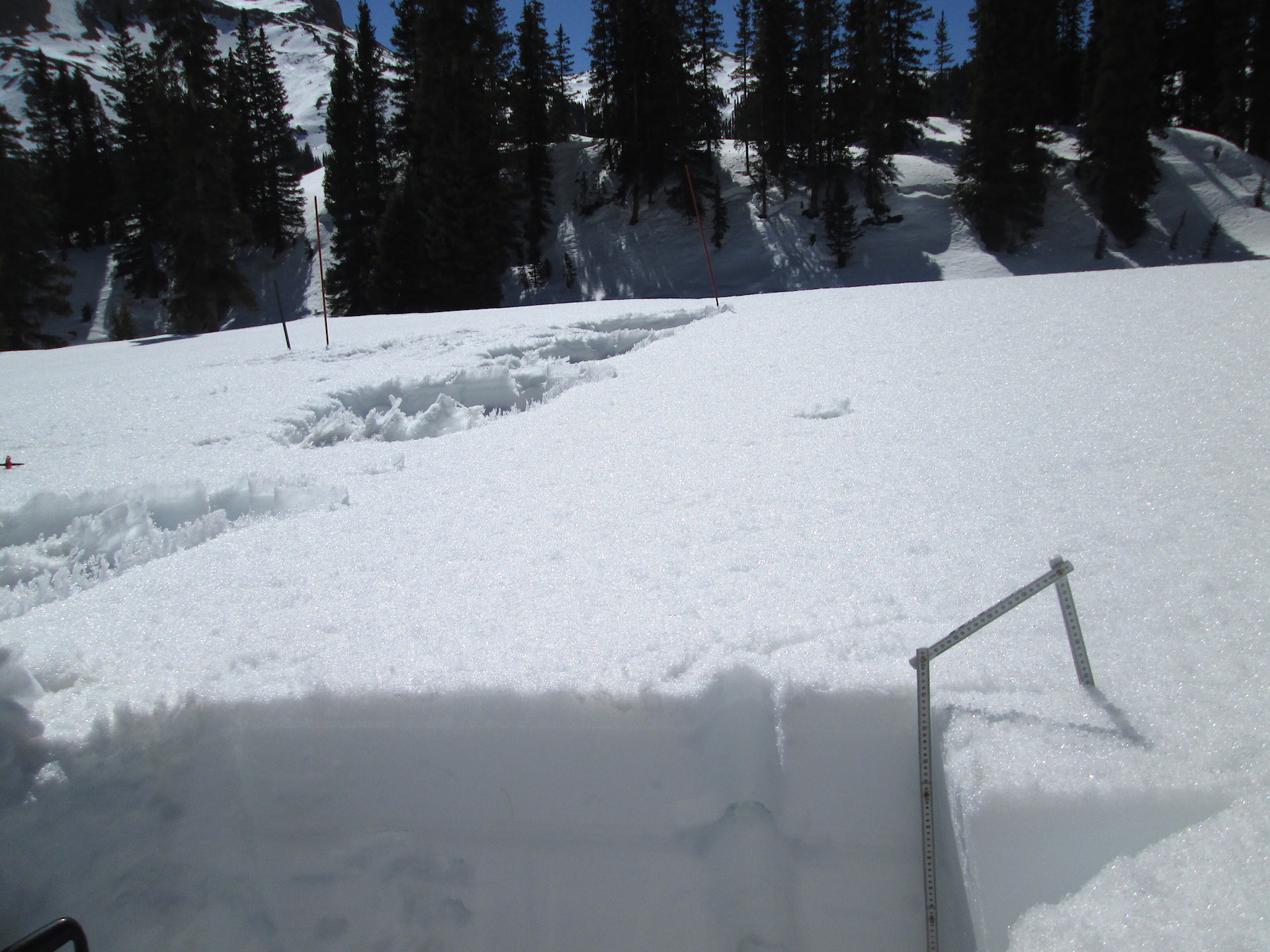 The April 14 Swamp Angel Study Plot snow profile #16 (in progress) is in the foreground, and the partially re-filled older snow profiles holes (there’s never enough snow to completely refill these holes) dating back several weeks are seen in the background, still unfilled and smoothed over by new snow.
