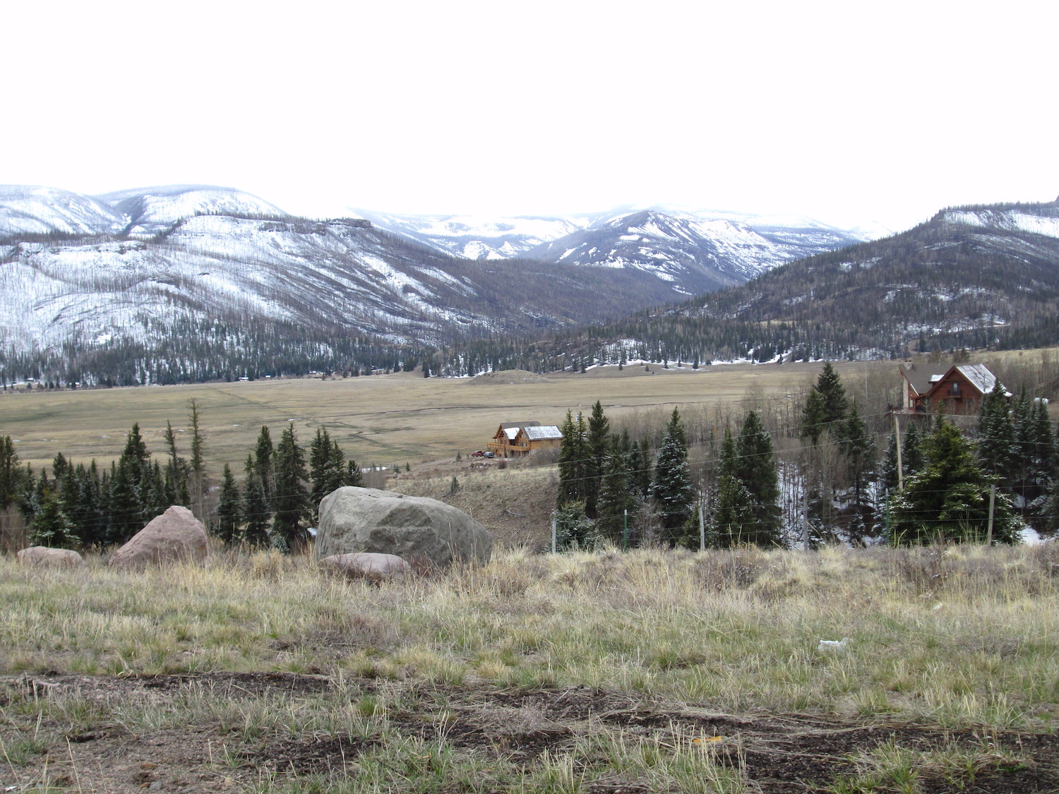 The snowcover was thin or altogether gone in the lower elevation burned areas at the edge of the completely snow-free valley floor.