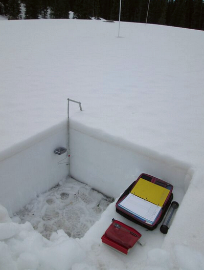 June 1, 2015 snow profile at the Grand Mesa CODOS snow profile site. Dust from events D3, D2, and potentially D1 was diffusely present throughout the top 3” of the snowpack but had most strongly concentrated, during melt infiltration and rain-on-snow, into the brown band some 3” below the snowpack surface. Some small reduction in snow albedo was already underway and would increase quickly, as melt revealed the more intense band of dust. 