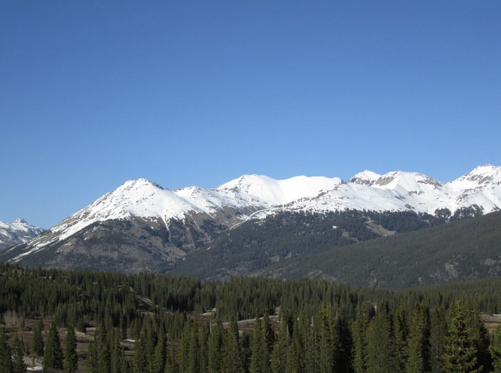 The view on June 2 looking northeast from Molas Pass of Kendall Mountain (13,338’) on the left, immediately above Silverton, and assorted high terrain to the south of Kendall Mountain. Snowline was retreating above treeline on these southwest and west aspects.