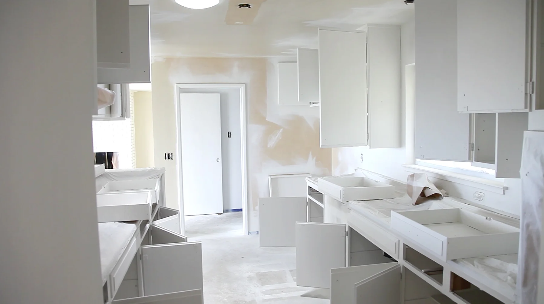 The kitchen undergoing a new paint job.